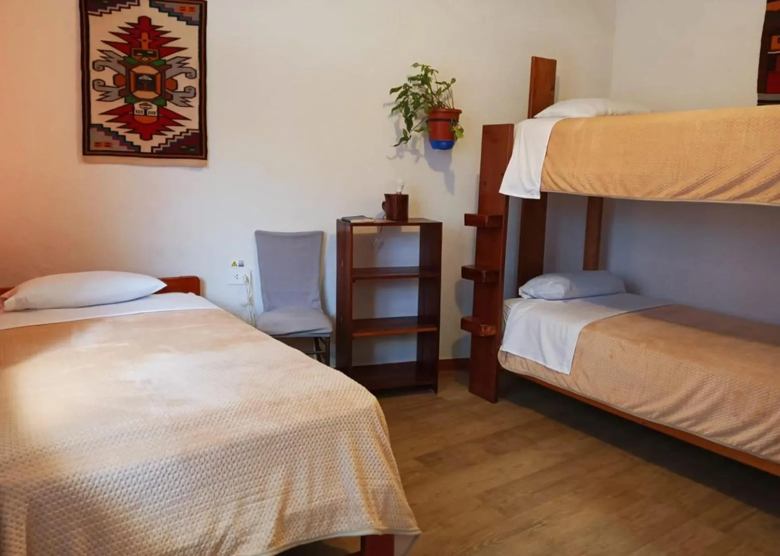 Triple Room in Hostal Chimenea