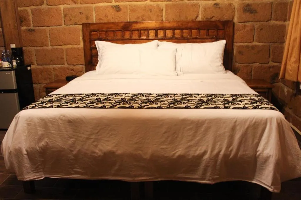 Bed in Hotel Real Nirvana