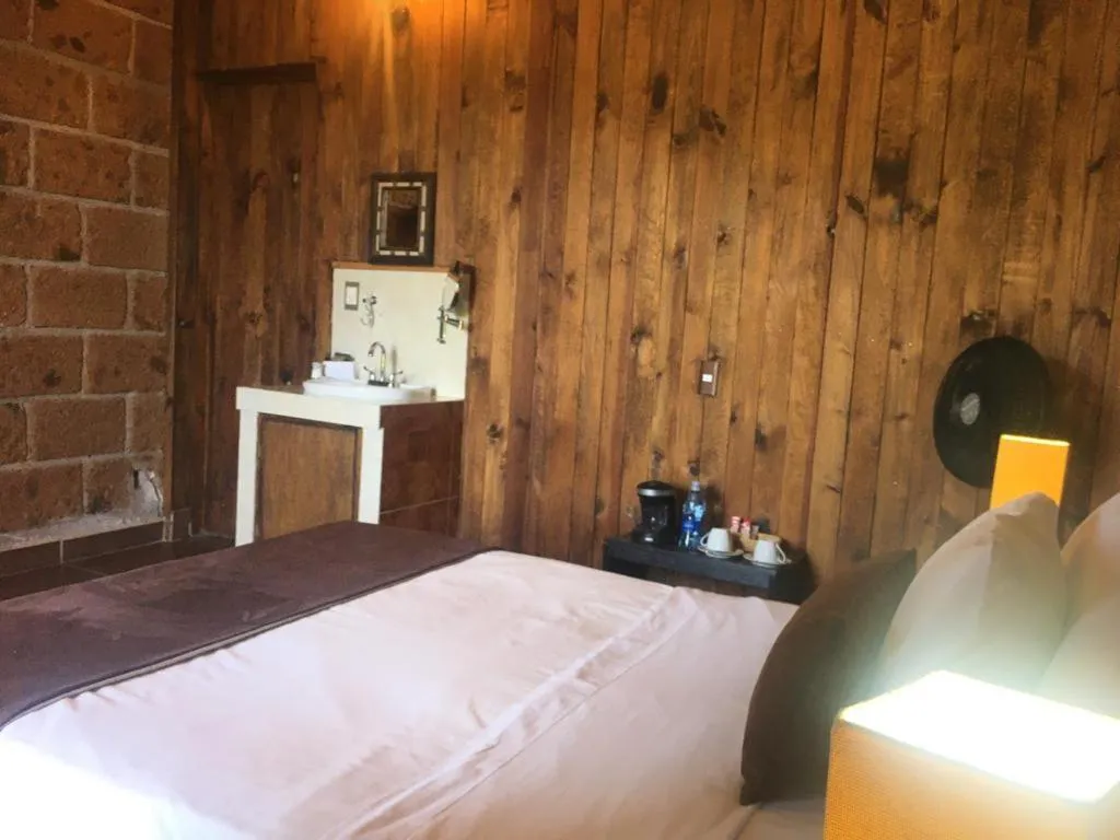 Bed in Hotel Real Nirvana