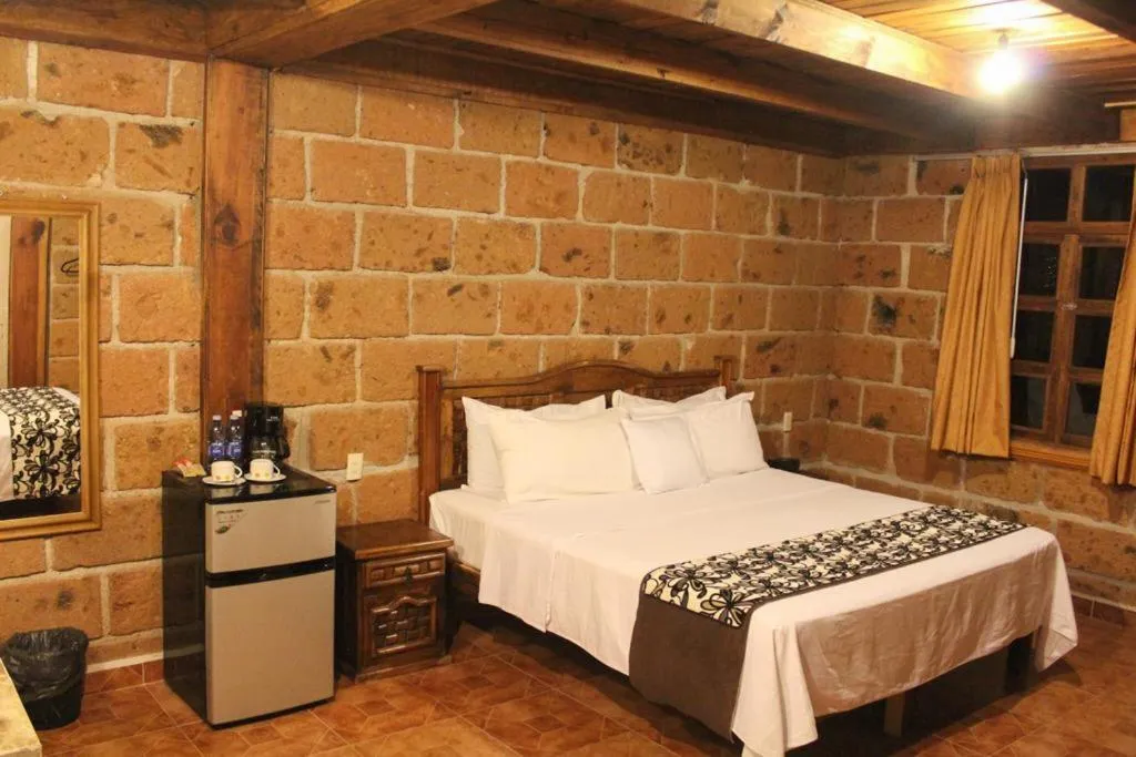 Bed in Hotel Real Nirvana