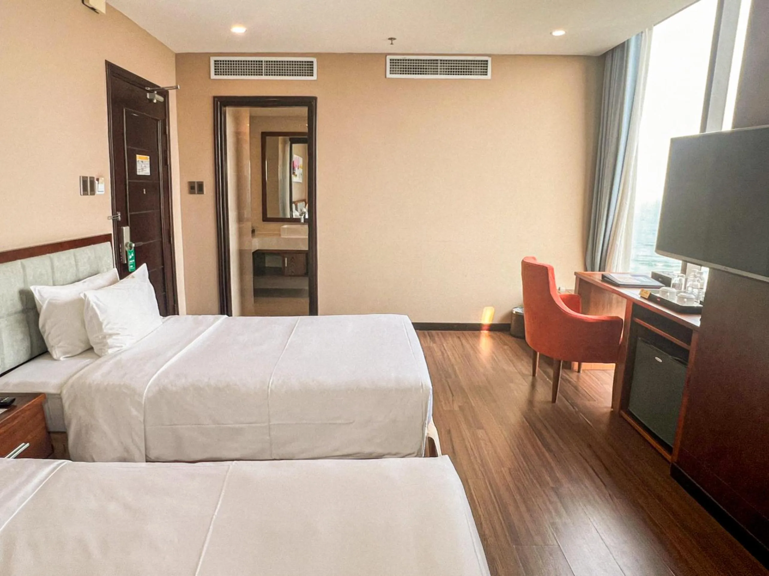 Bed in Yarra Ocean Suites Danang