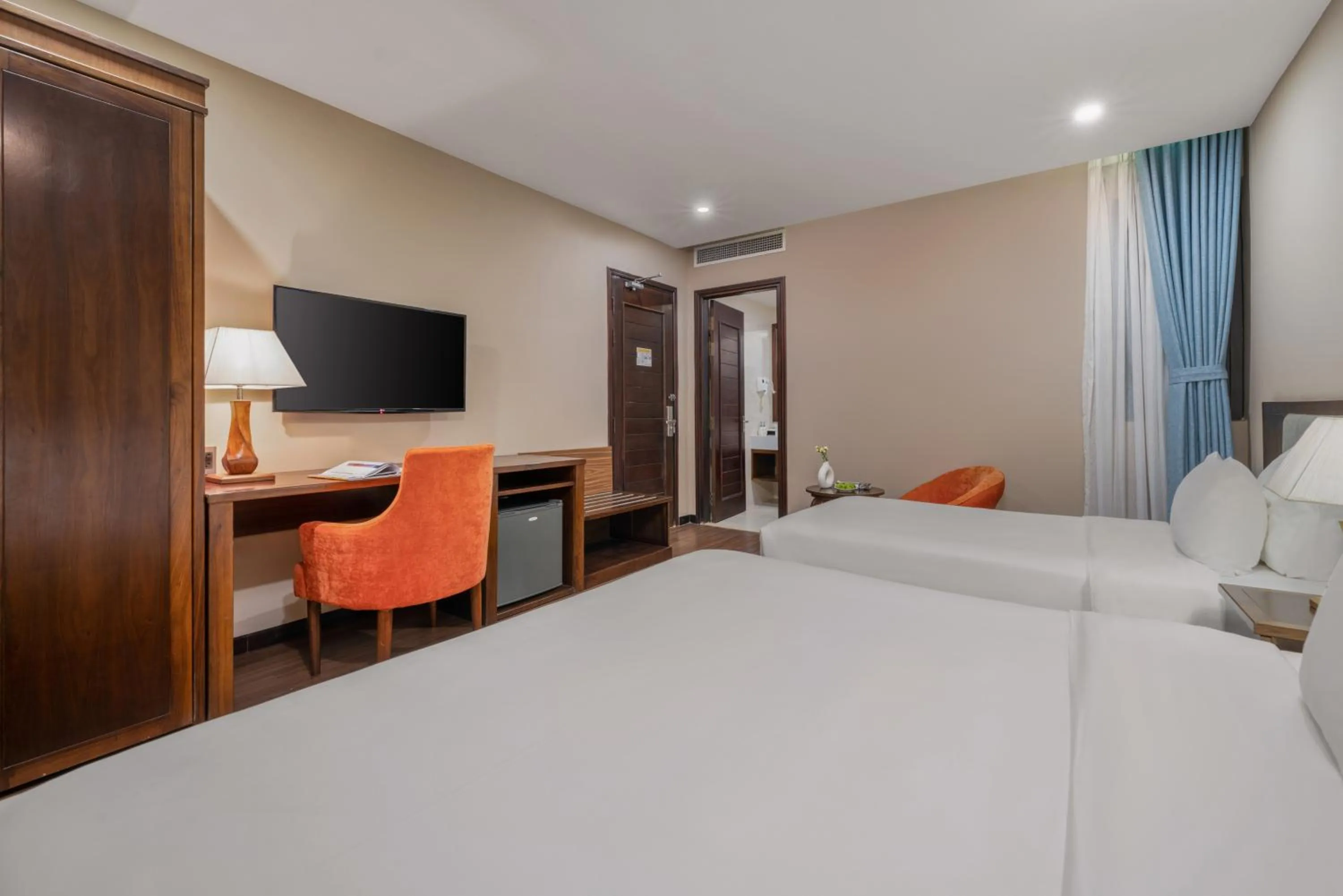 Bed in Yarra Ocean Suites Danang