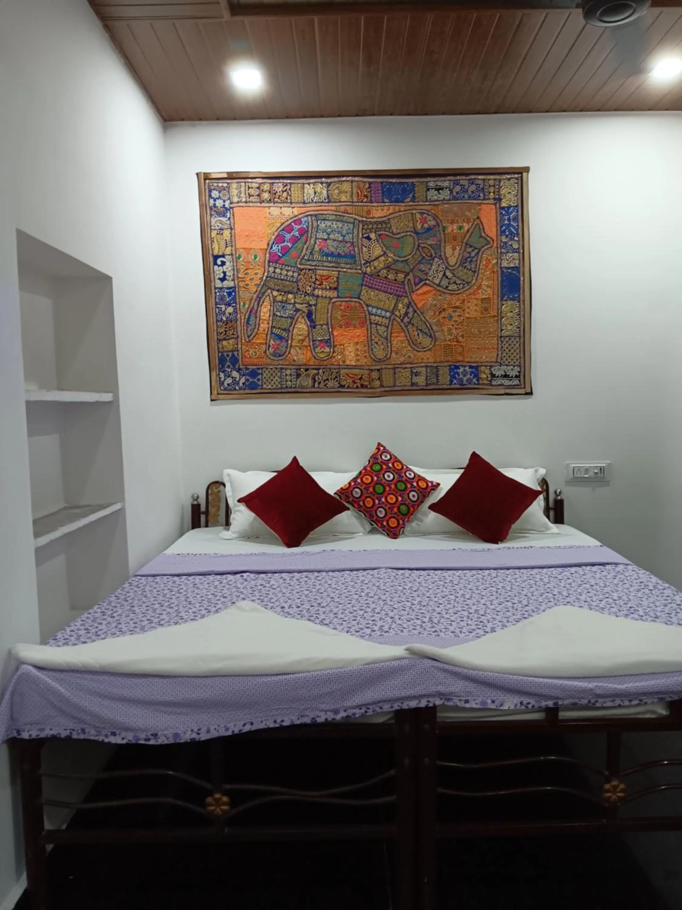 Bed in Mayur Guest House