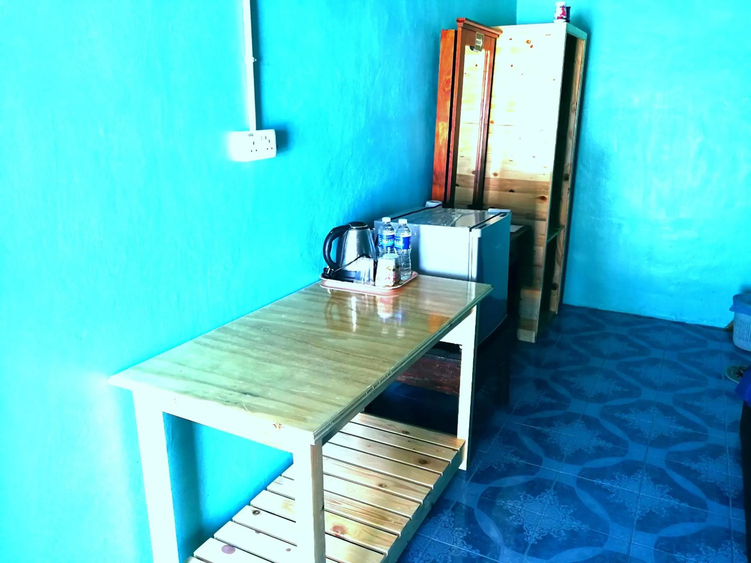 Kitchen or kitchenette in Rainbow Tioman Cottage