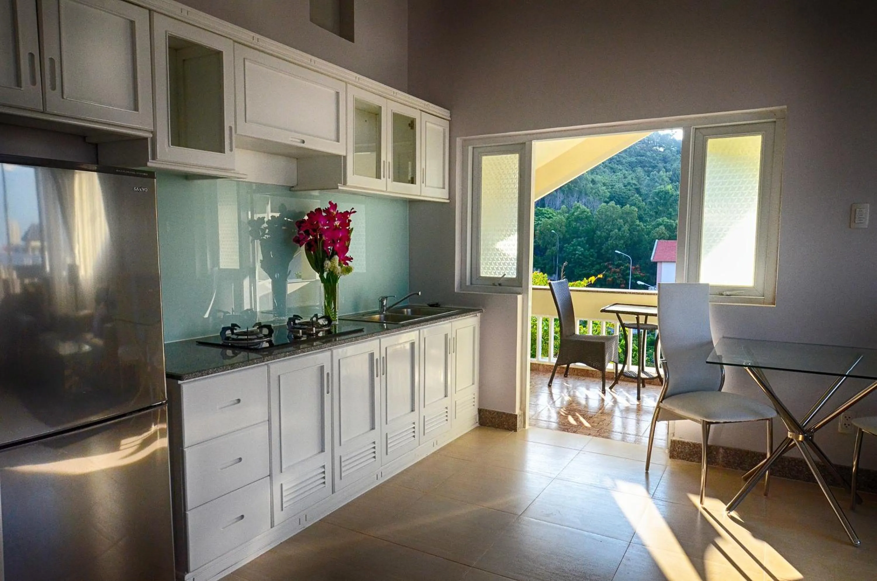Kitchen or kitchenette in The Wind Resort - Tropical Hillside Escape