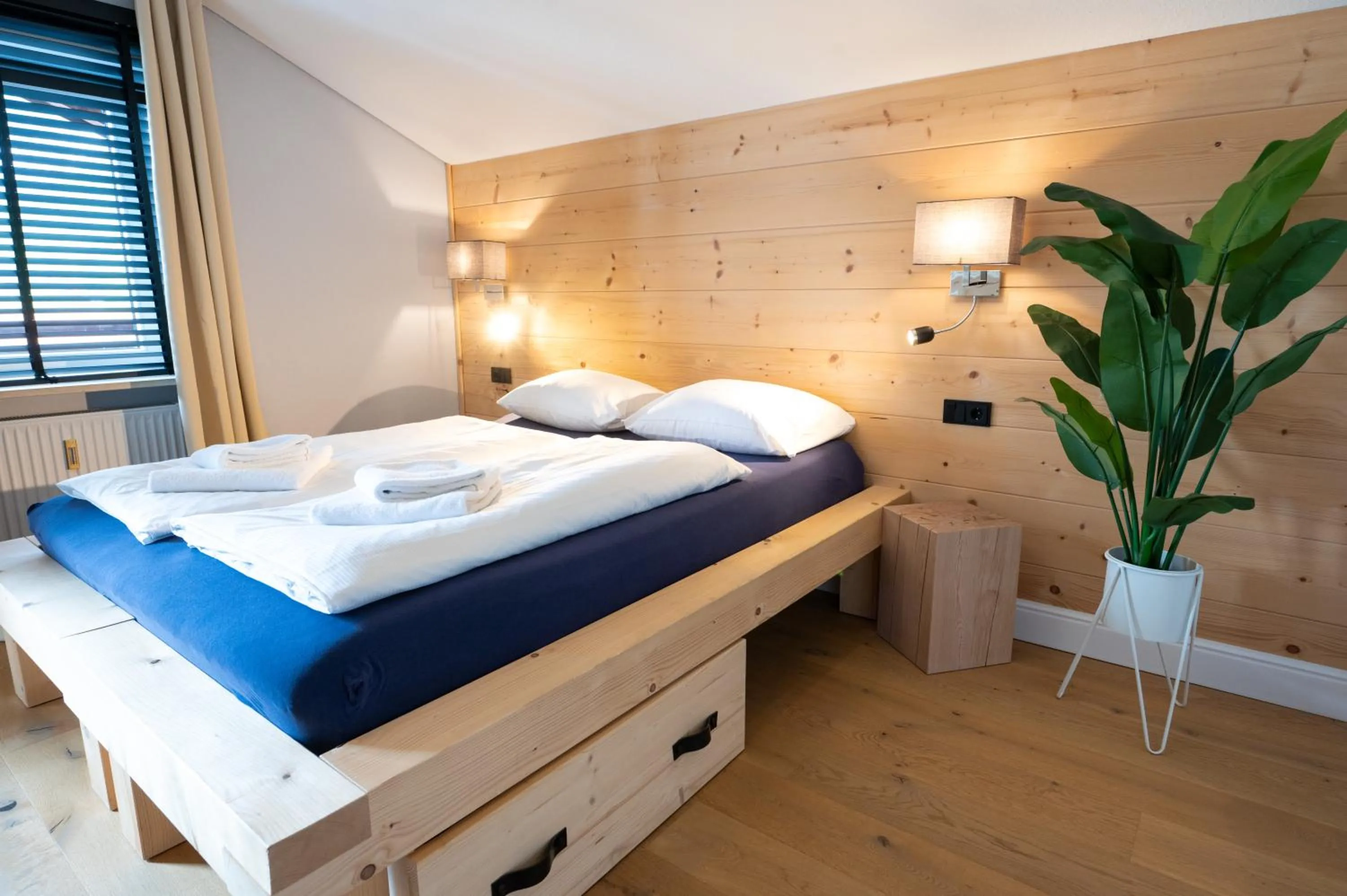 Bedroom, Bed in ALPENLIEBE - Sauna & Whirlpool - APARTments