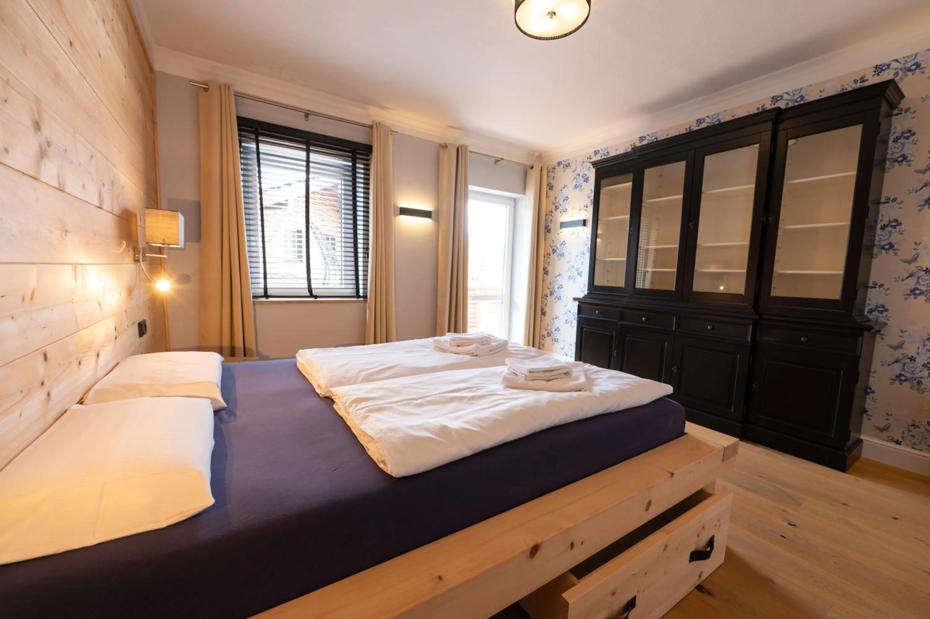 Bedroom, Bed in ALPENLIEBE - Sauna & Whirlpool - APARTments