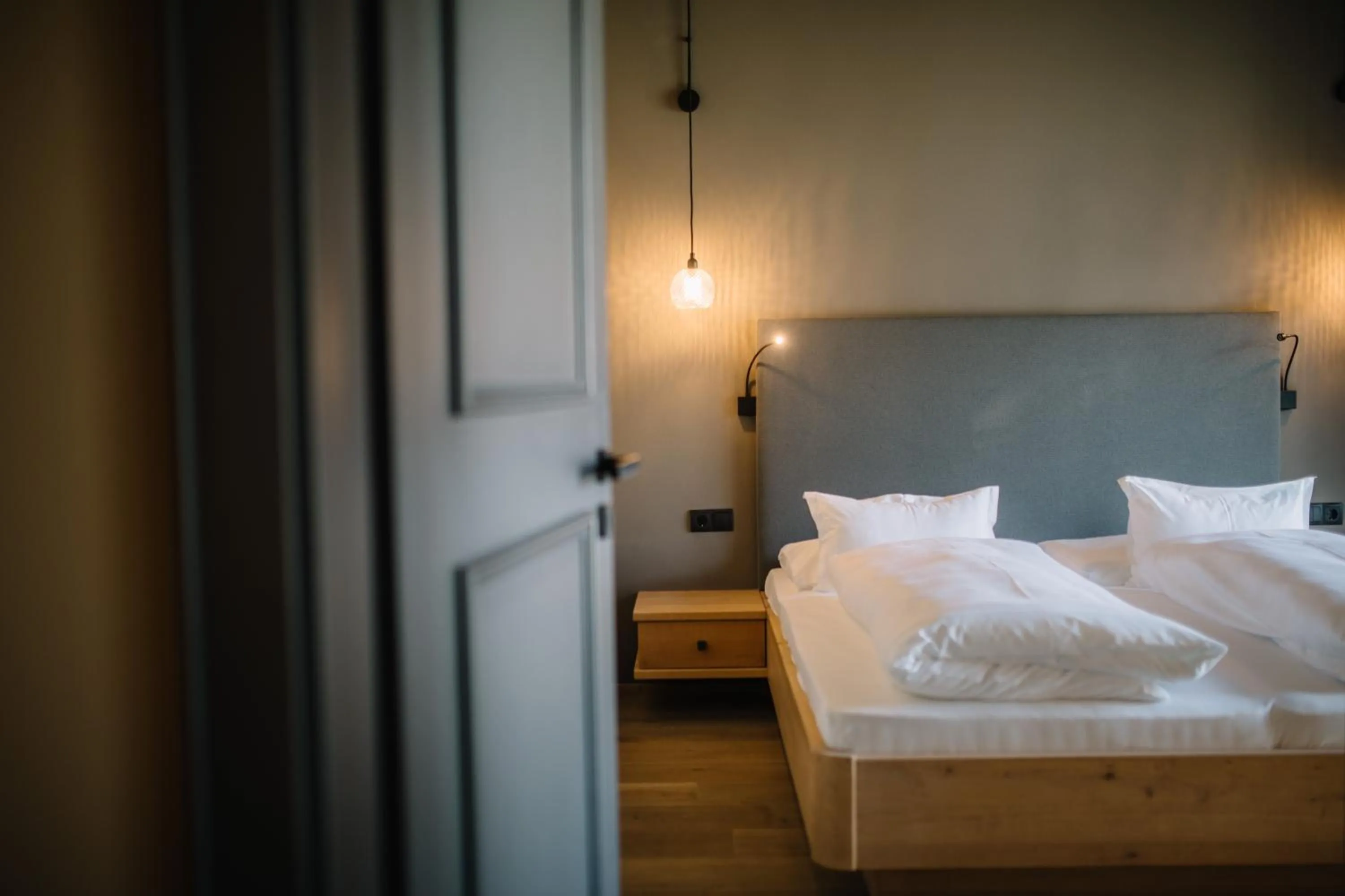 Bed in Panoramic Suites Winzerhöhe