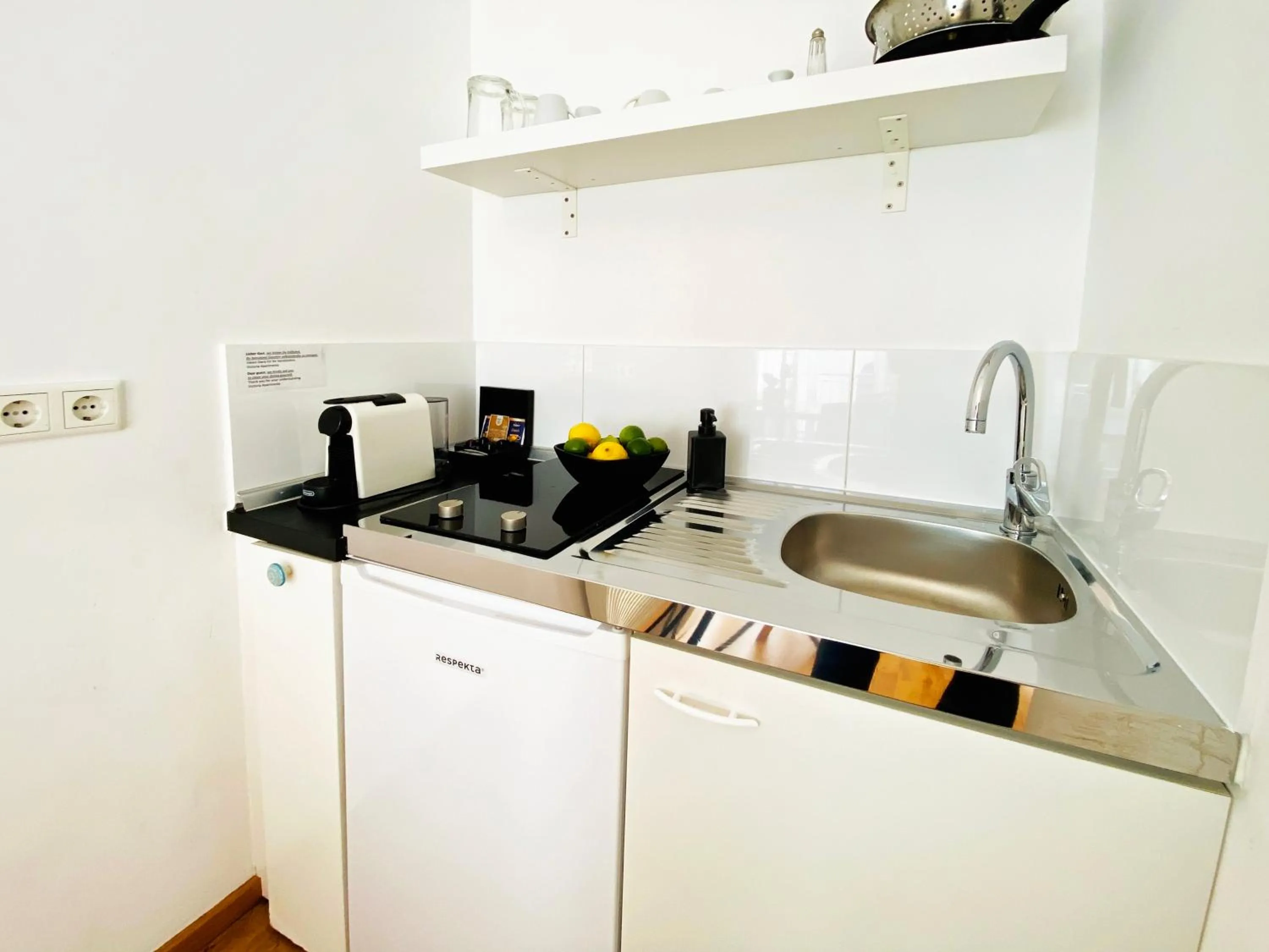 Kitchen or kitchenette in Victoria Apartments