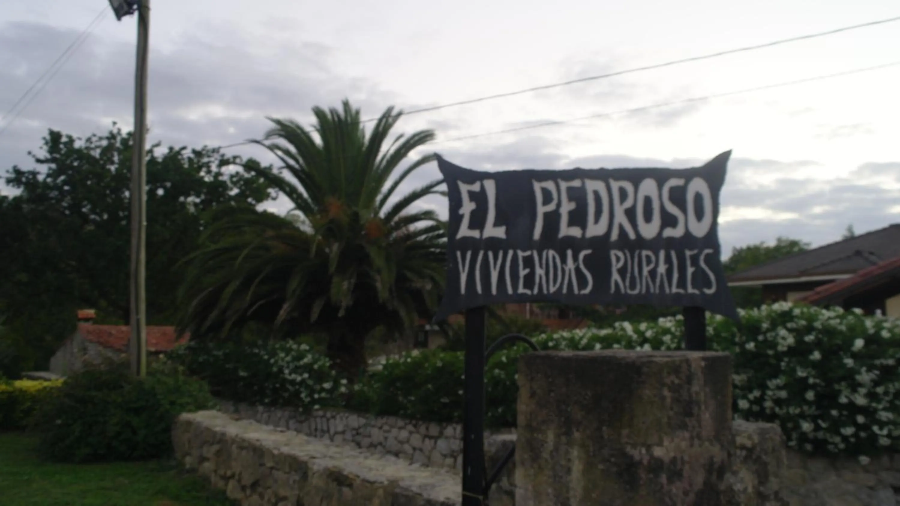 Property logo or sign in El Pedroso