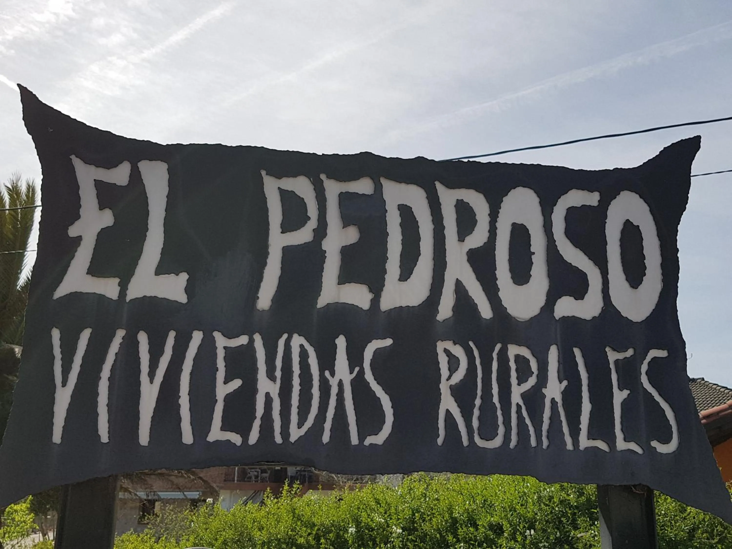 Property logo or sign in El Pedroso