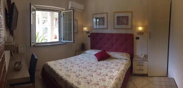 Photo of the whole room, Bed in B&B Primerano SP73