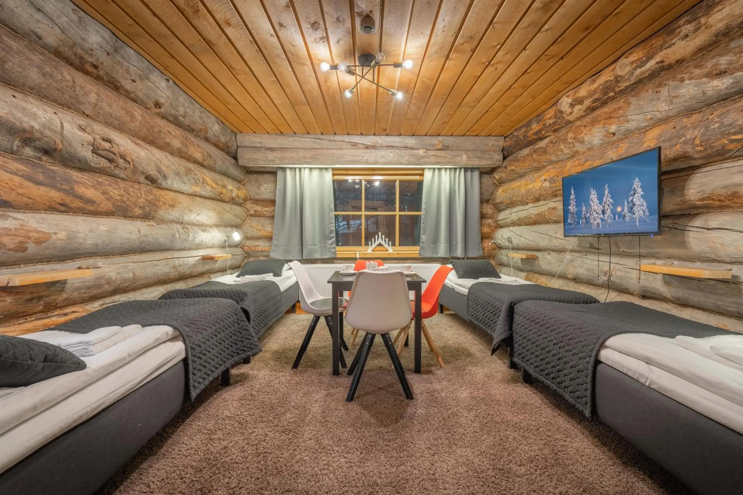 Quadruple Room with Shared Bathroom in Kuukkeli Log Houses Aurora Resort Quadruple Room with Shared Bathroom in Kuukkeli Log Houses Aurora Resort