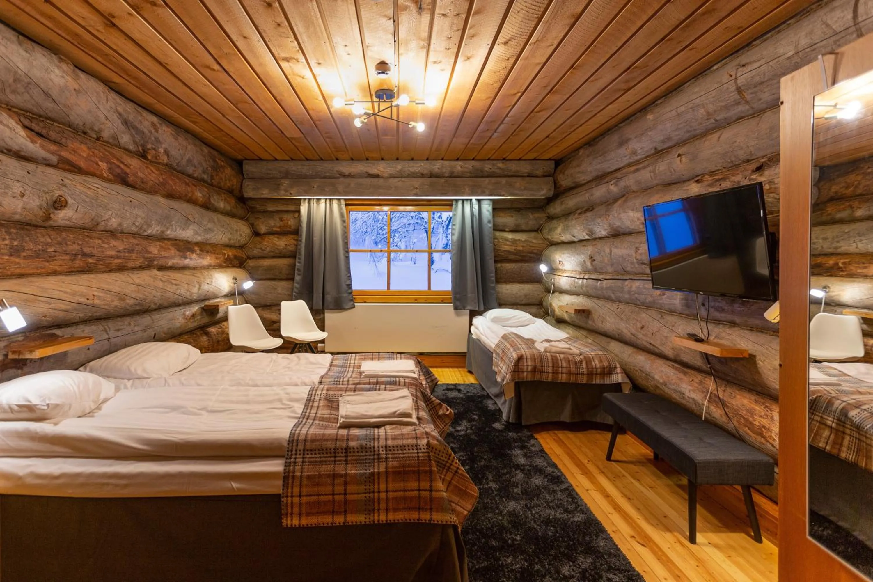 Triple Room with Shared Bathroom in Kuukkeli Log Houses Aurora Resort