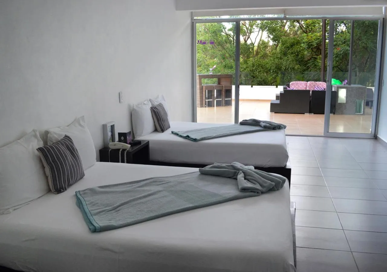 Bed in Rancho Macloy Hotel Spa & Social Events