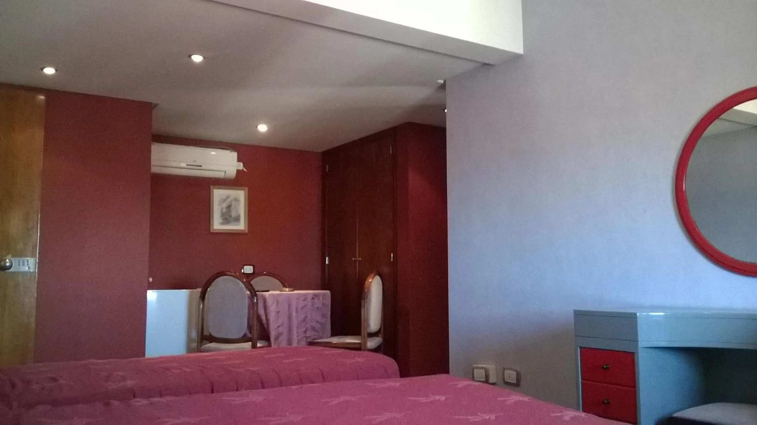Bed in Hotel Gran International