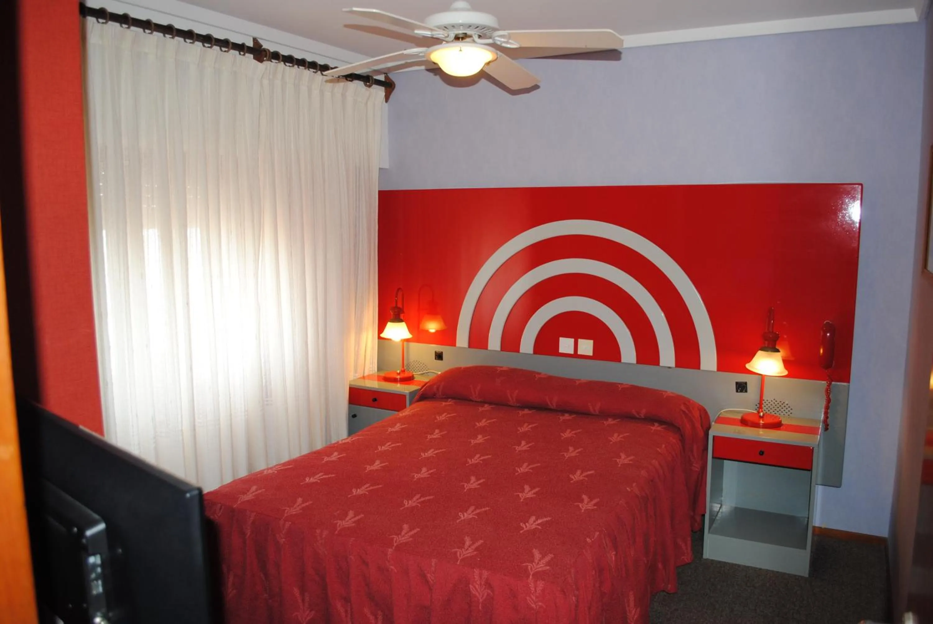 Bed in Hotel Gran International