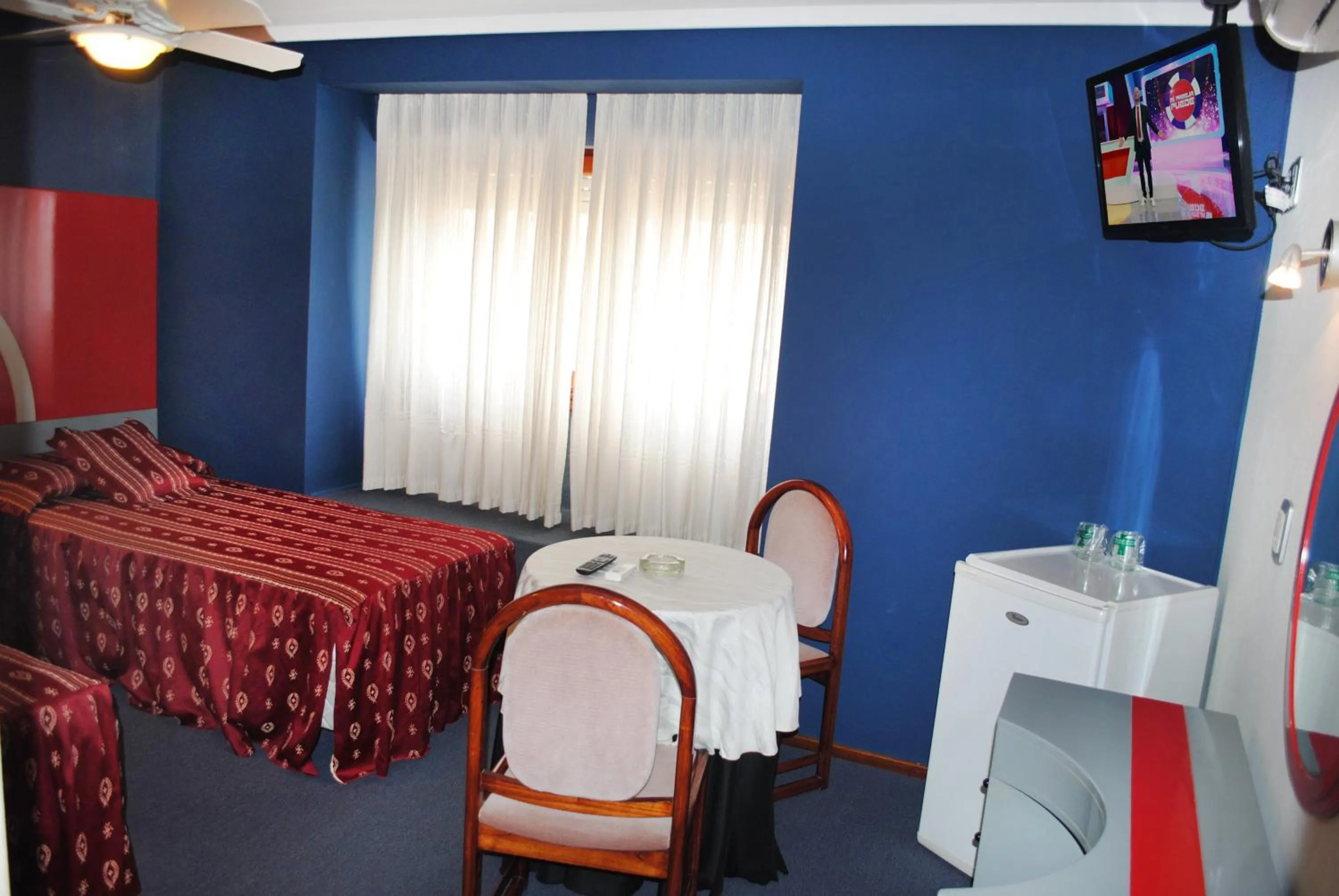 Bed in Hotel Gran International