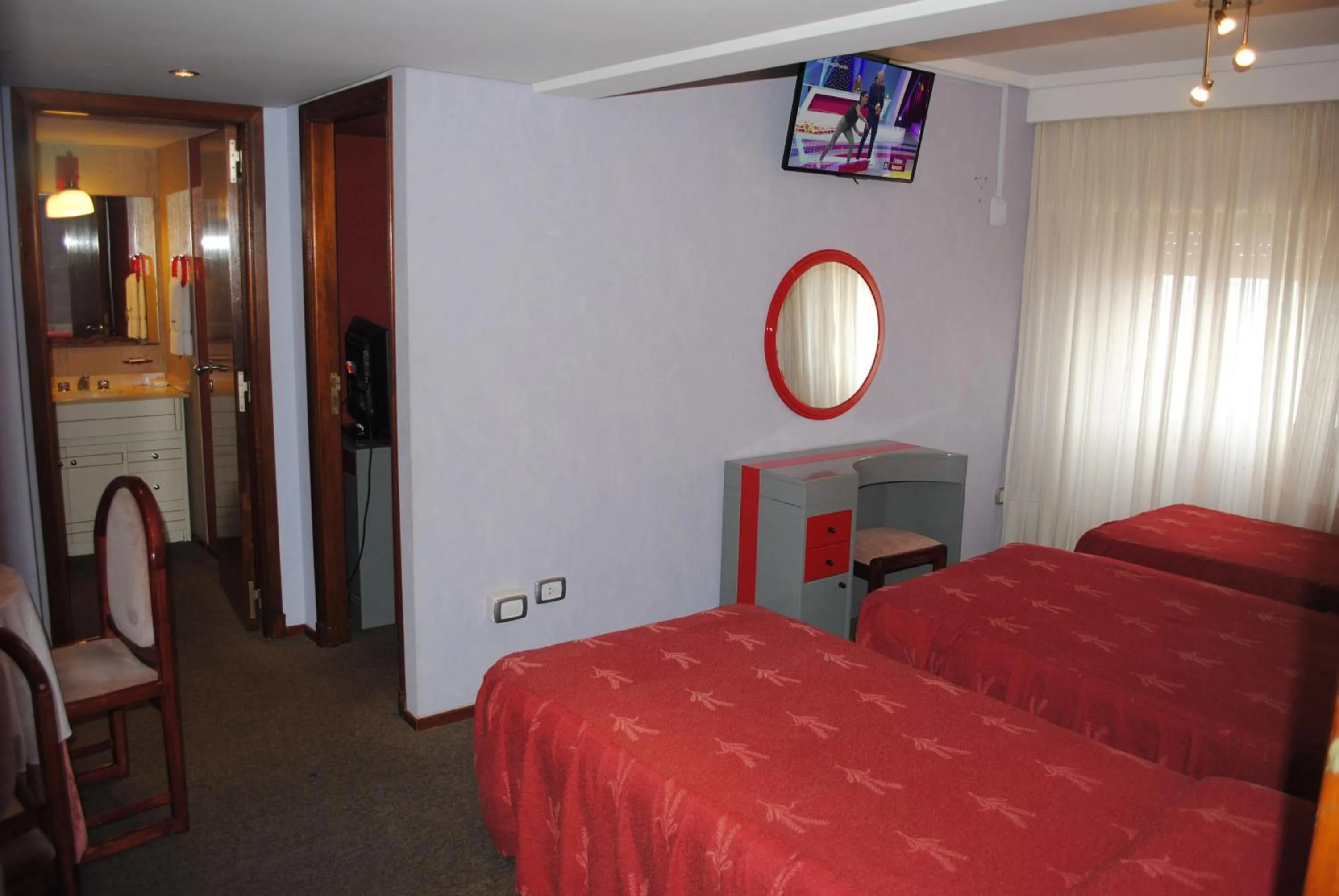 Bed in Hotel Gran International