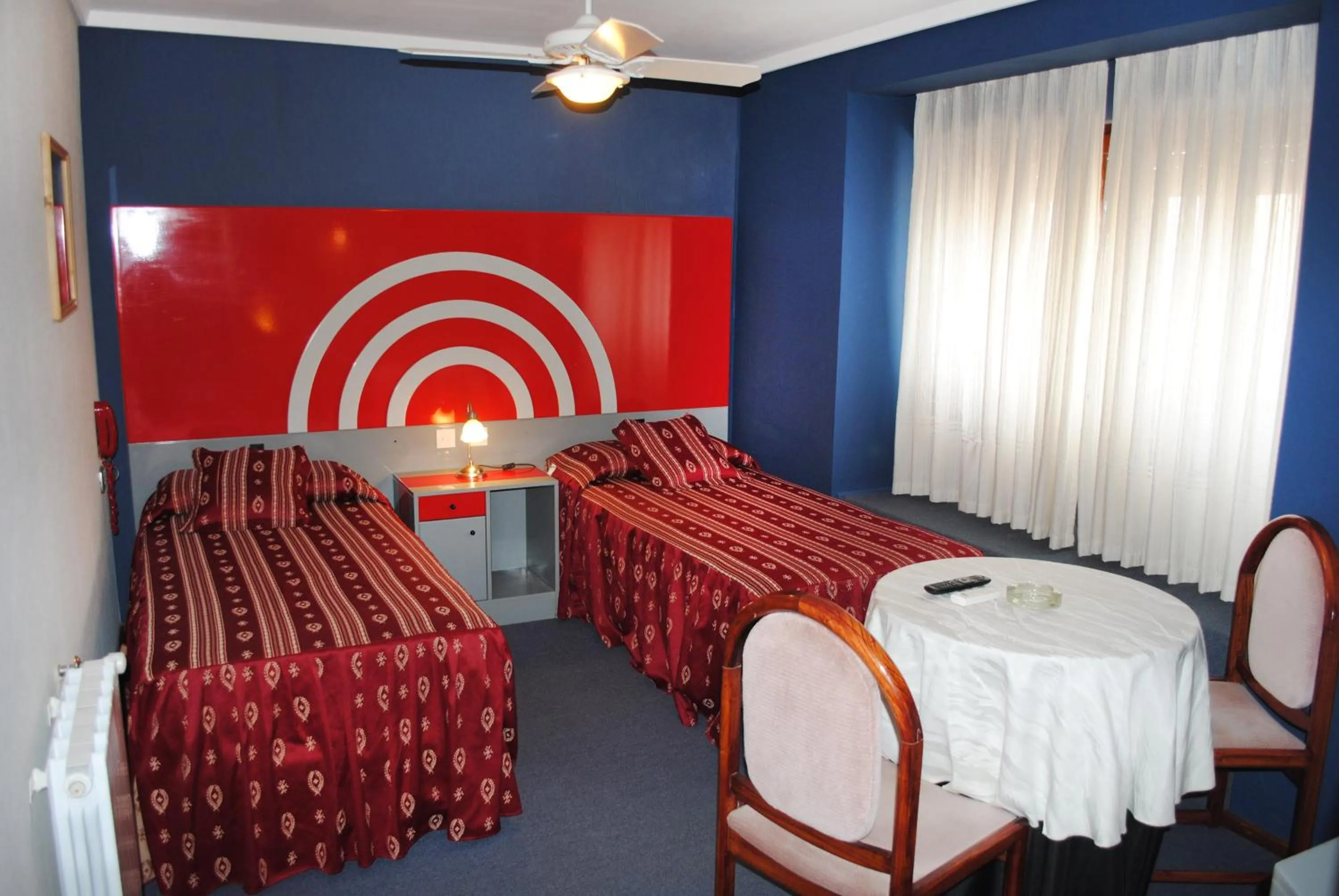Bed in Hotel Gran International
