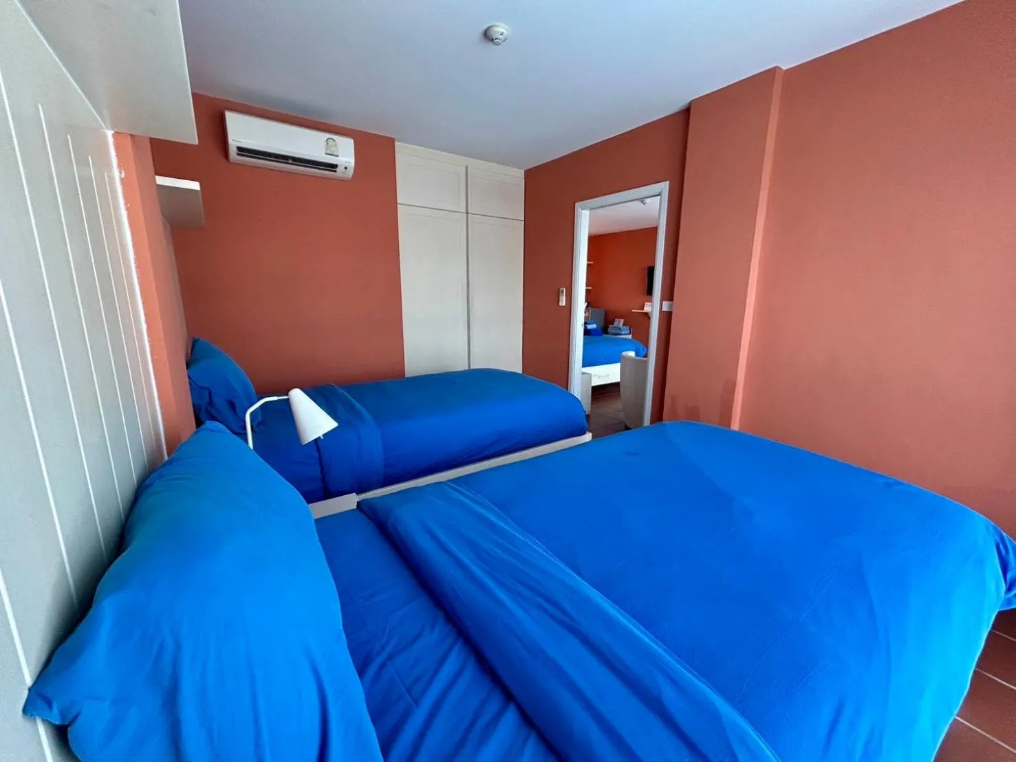 Bed in GrandBlue Resort & Beachclub