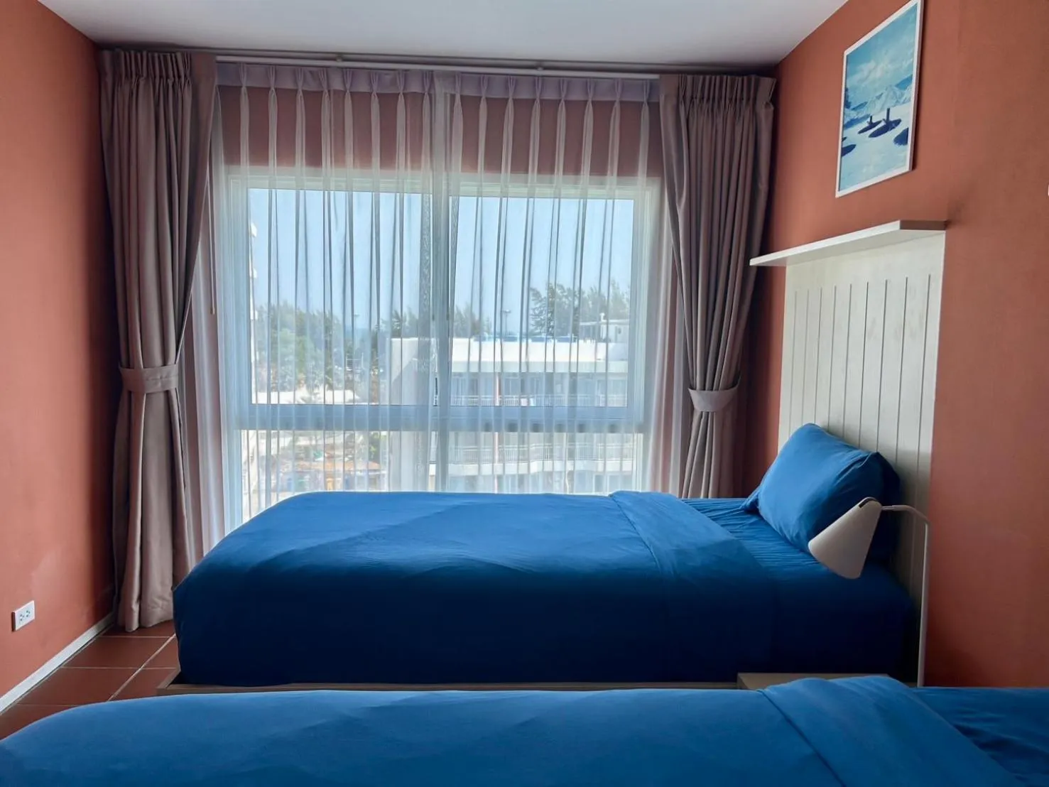 Bed in GrandBlue Resort & Beachclub
