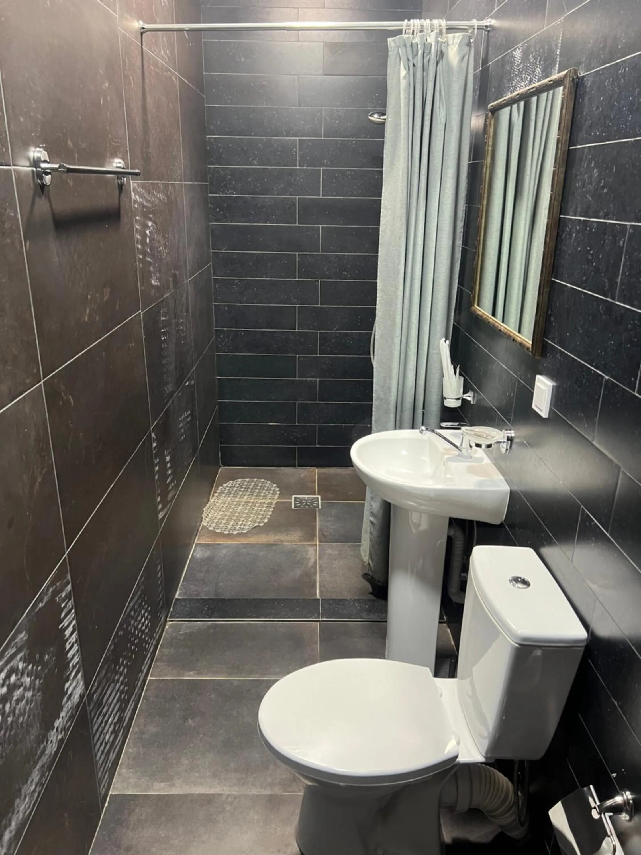 Toilet in Maximus hotel