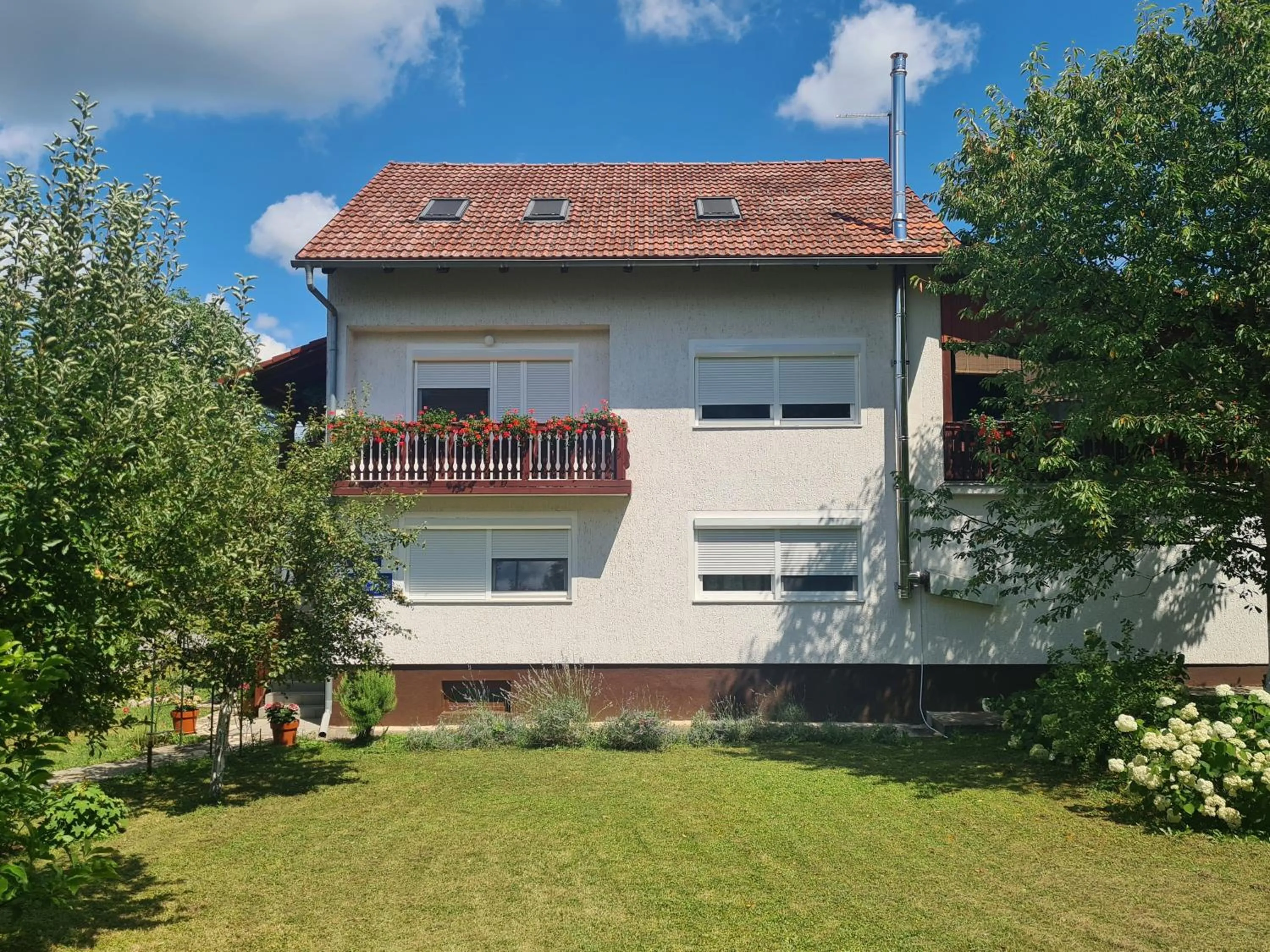 Property building in Rooms Garden