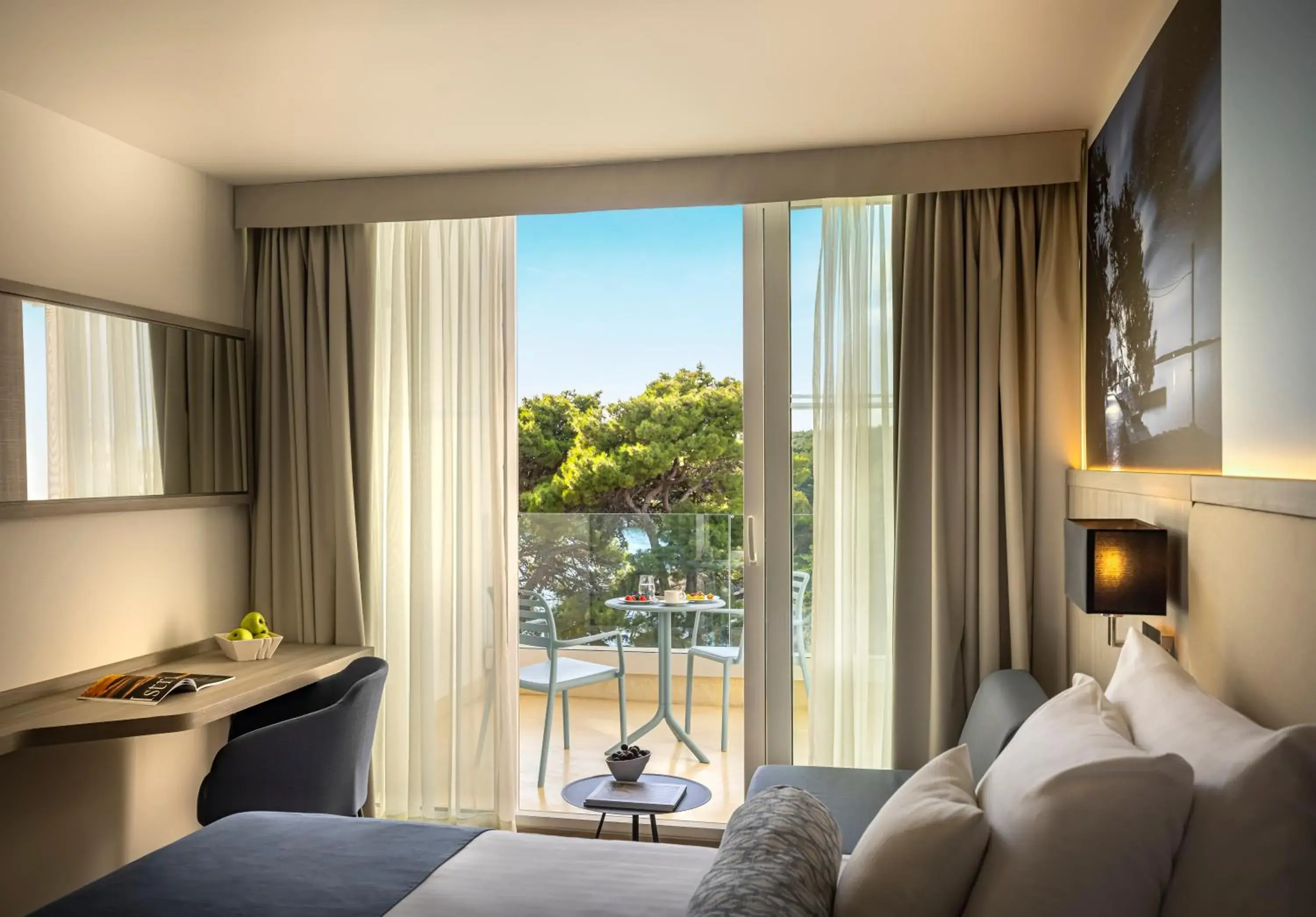 Balcony/Terrace, Bed in Valamar Carolina Hotel & Villas Balcony/Terrace, Bed in Valamar Carolina Hotel & Villas