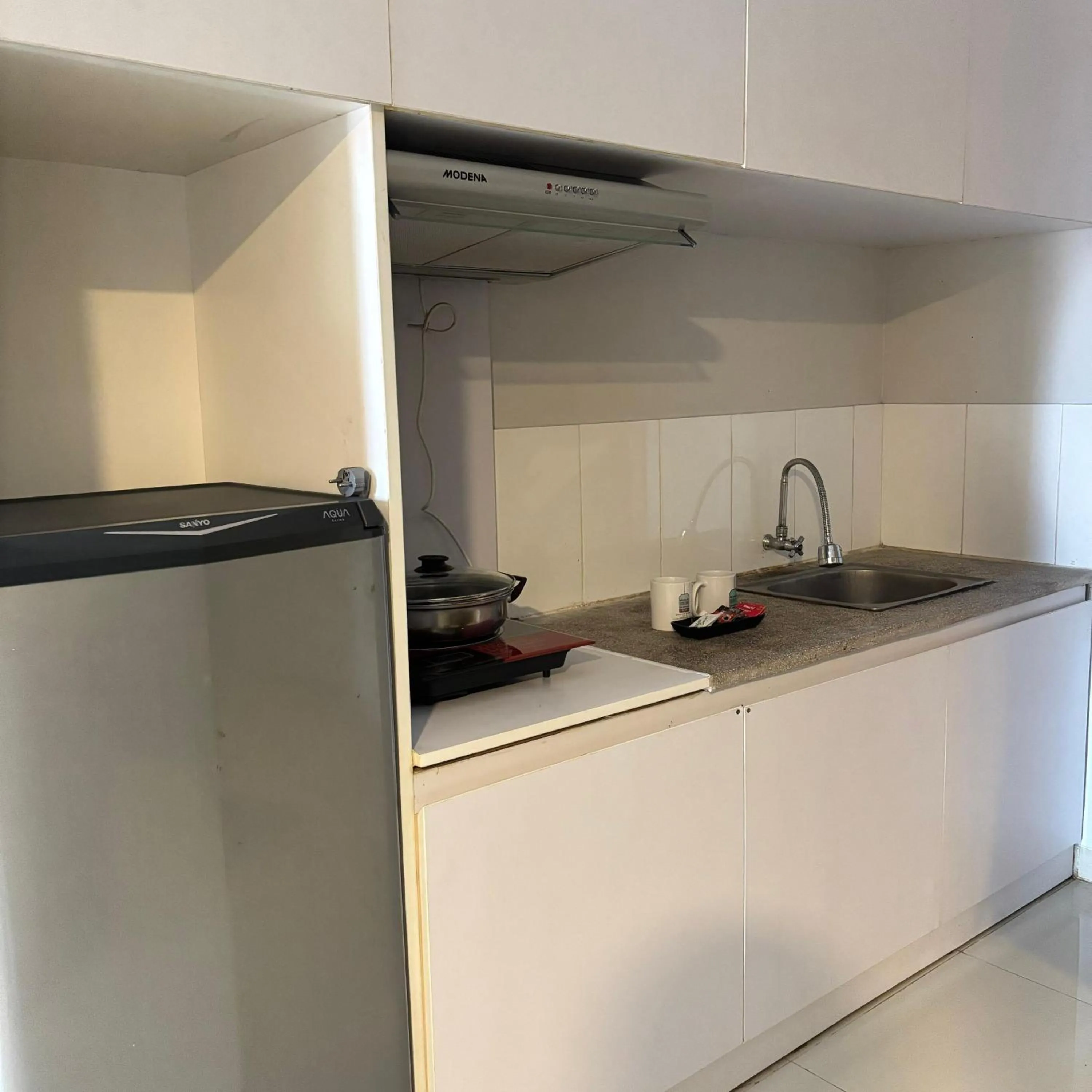 kitchen in Kyriad Haka Makassar