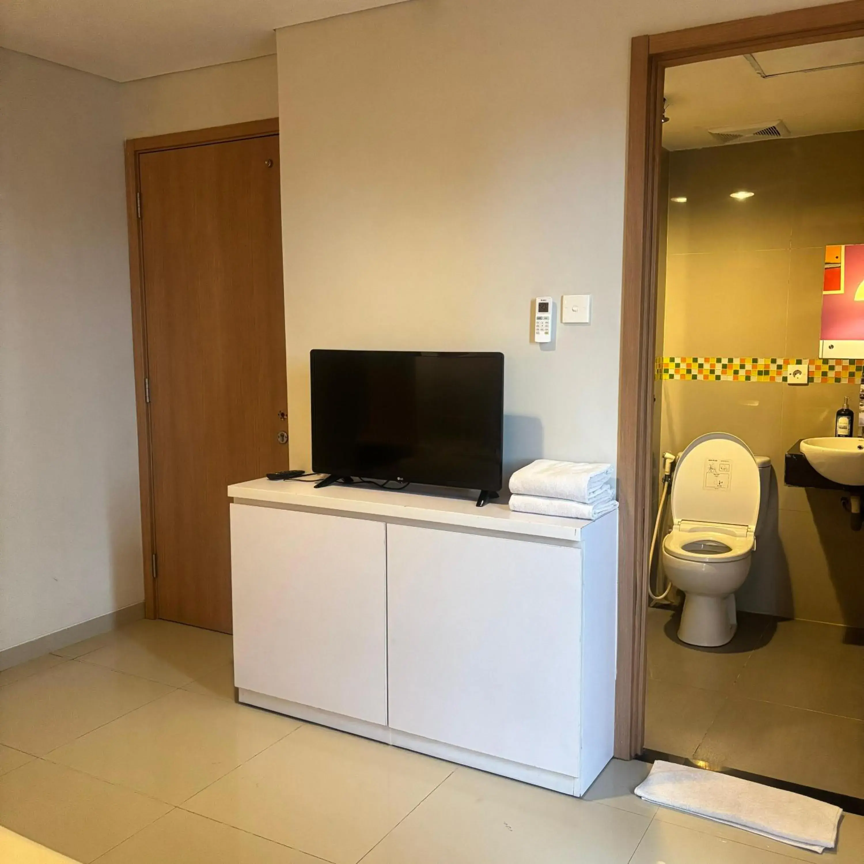 Bedroom in Kyriad Haka Makassar Bedroom in Kyriad Haka Makassar