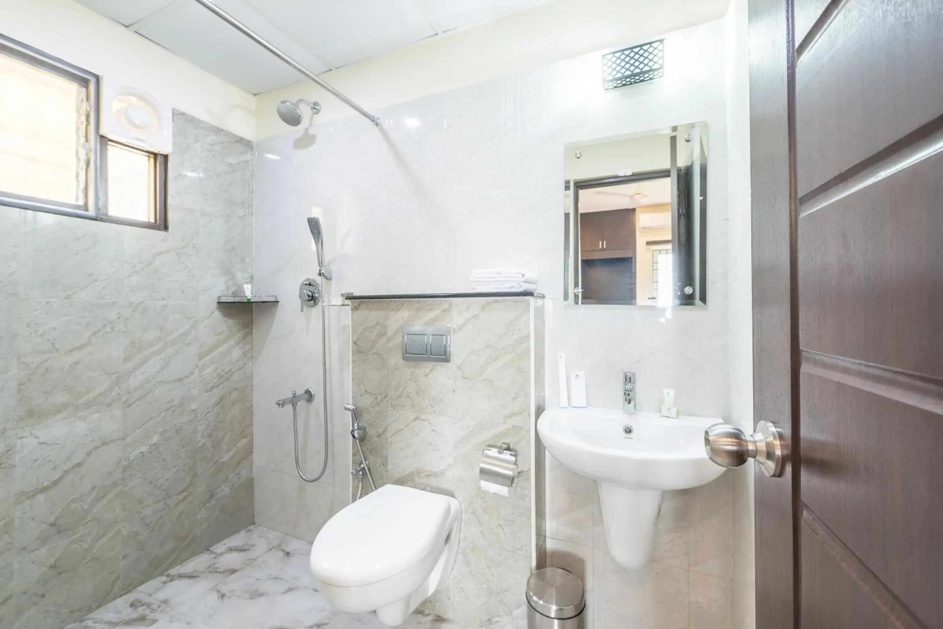 Bathroom in Treebo Adin Residence Chennai Trade Centre Bathroom in Treebo Adin Residence Chennai Trade Centre