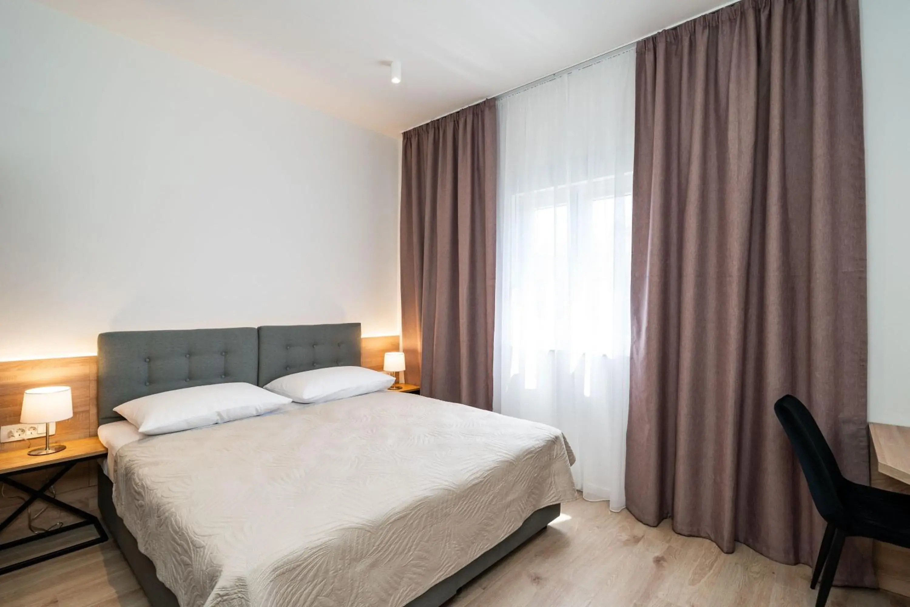 Bed in Bacan Serviced Apartments Bed in Bacan Serviced Apartments