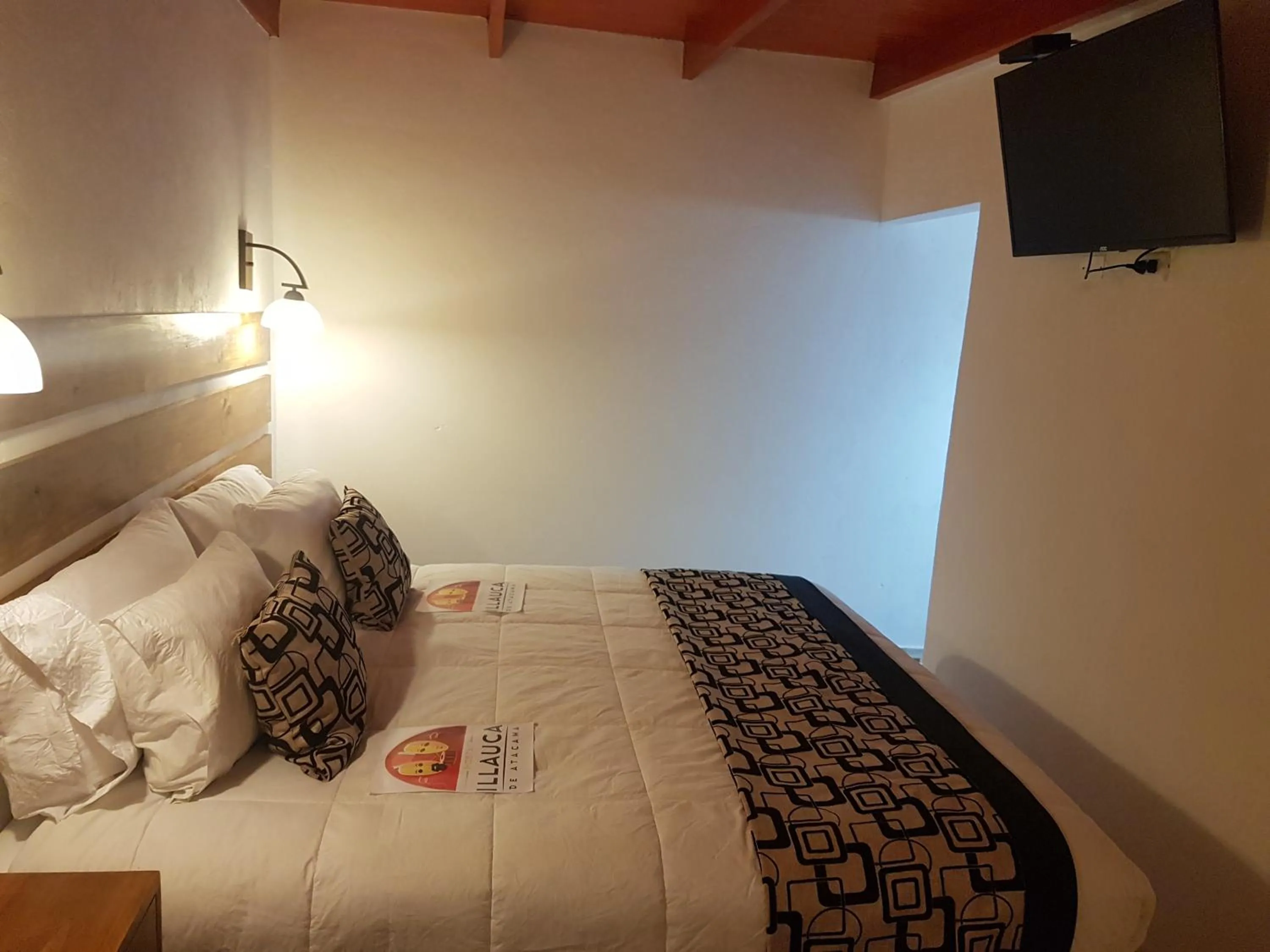 Bed in Hostal Illauca de Atacama