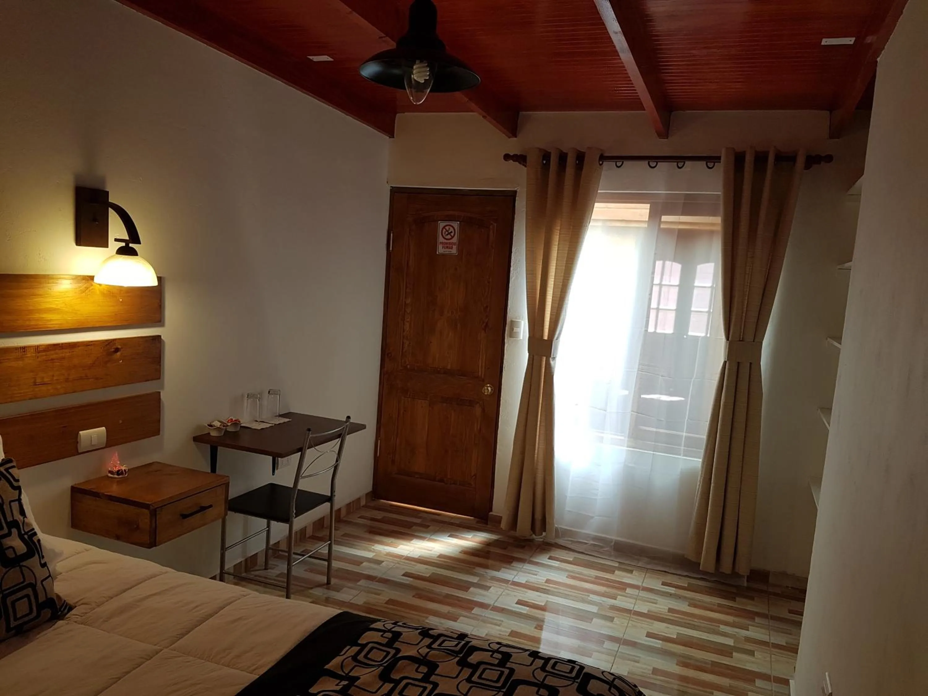 Bed in Hostal Illauca de Atacama