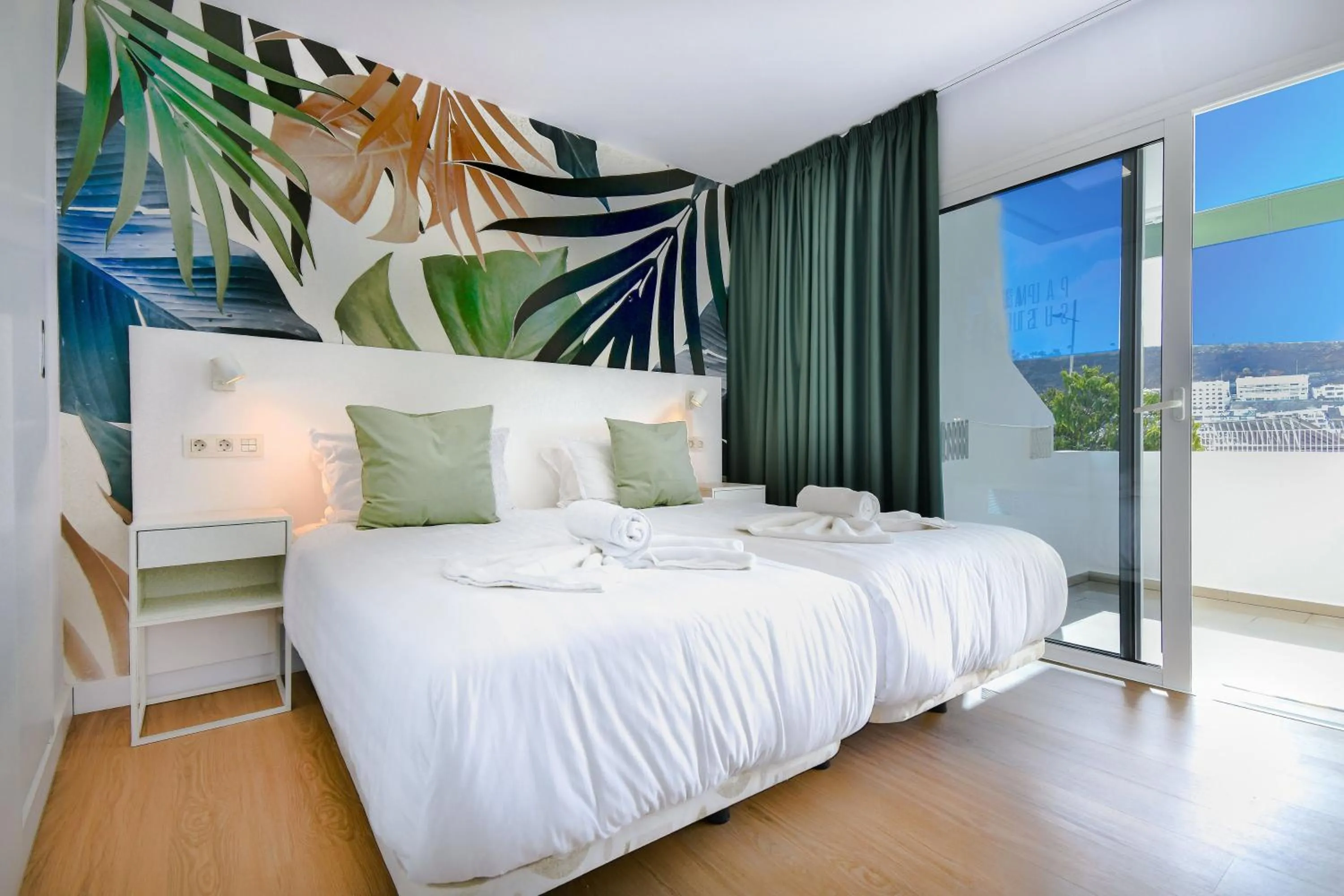 Bed in Palm Suites