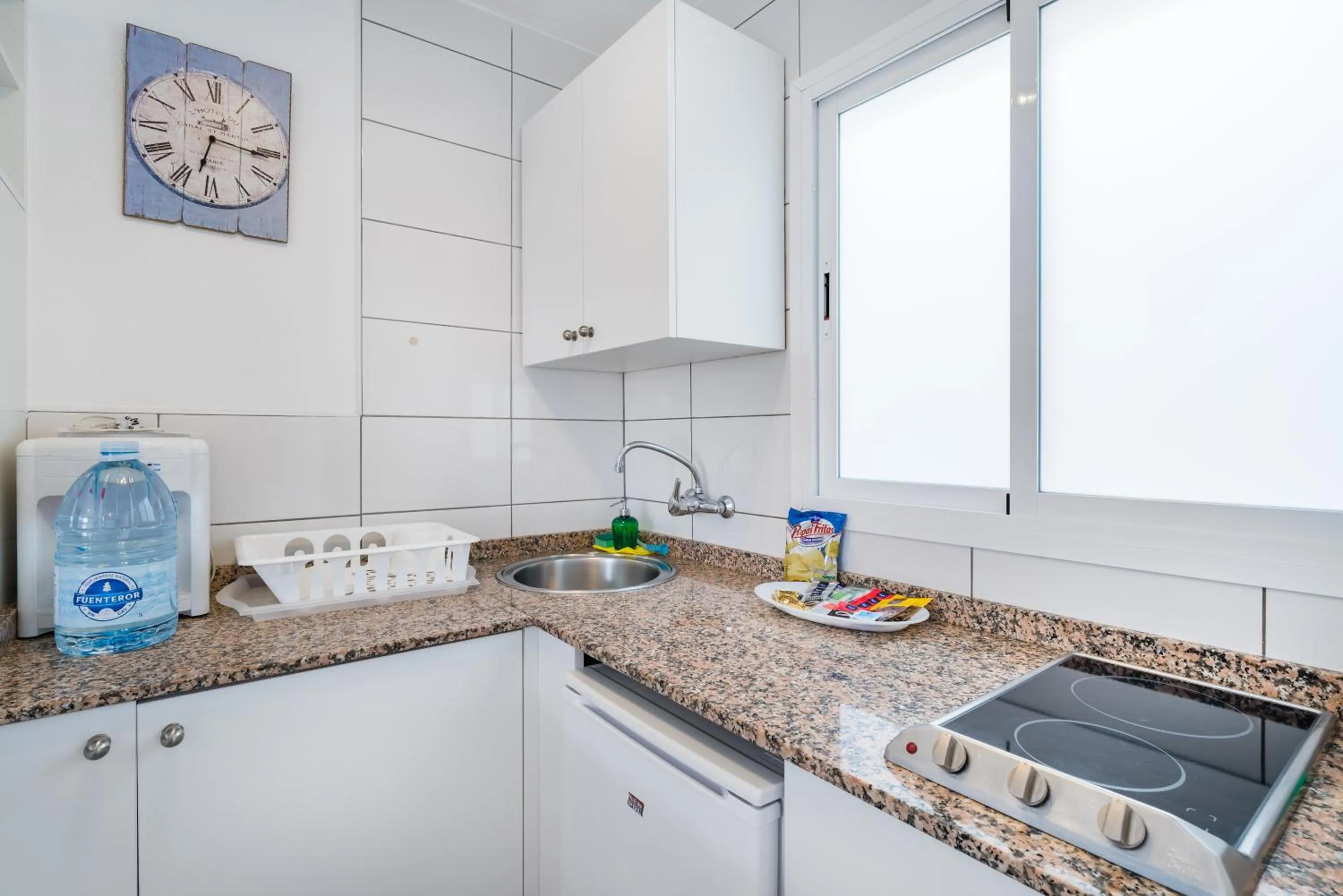 Kitchen or kitchenette in Calypso Oasis Apartments