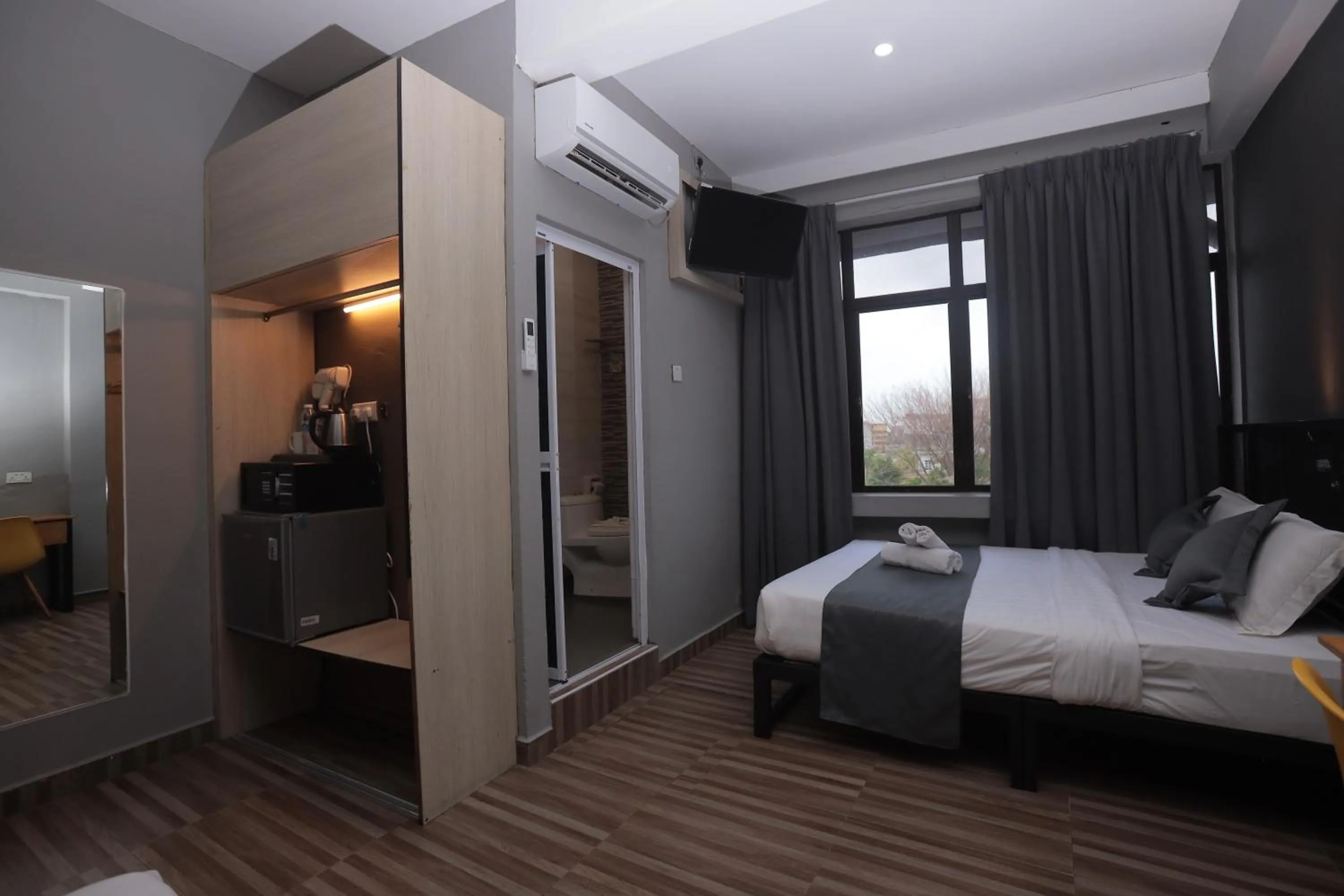 Bedroom, Bed in DJ Citi Inn Premier