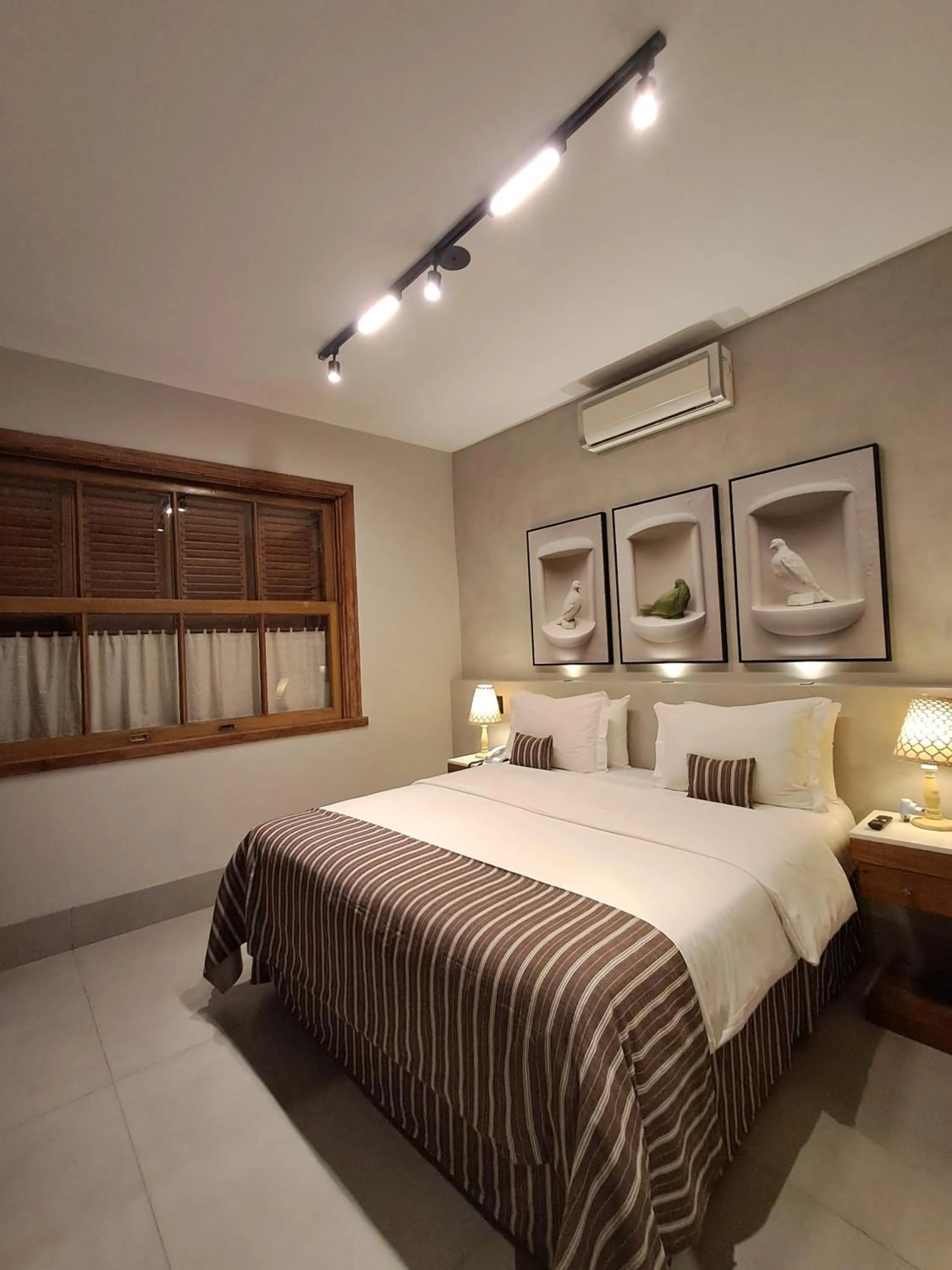 Photo of the whole room, Bed in Pousada Jeito de Minas