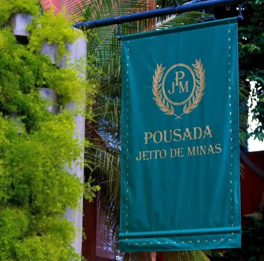 Property logo or sign in Pousada Jeito de Minas