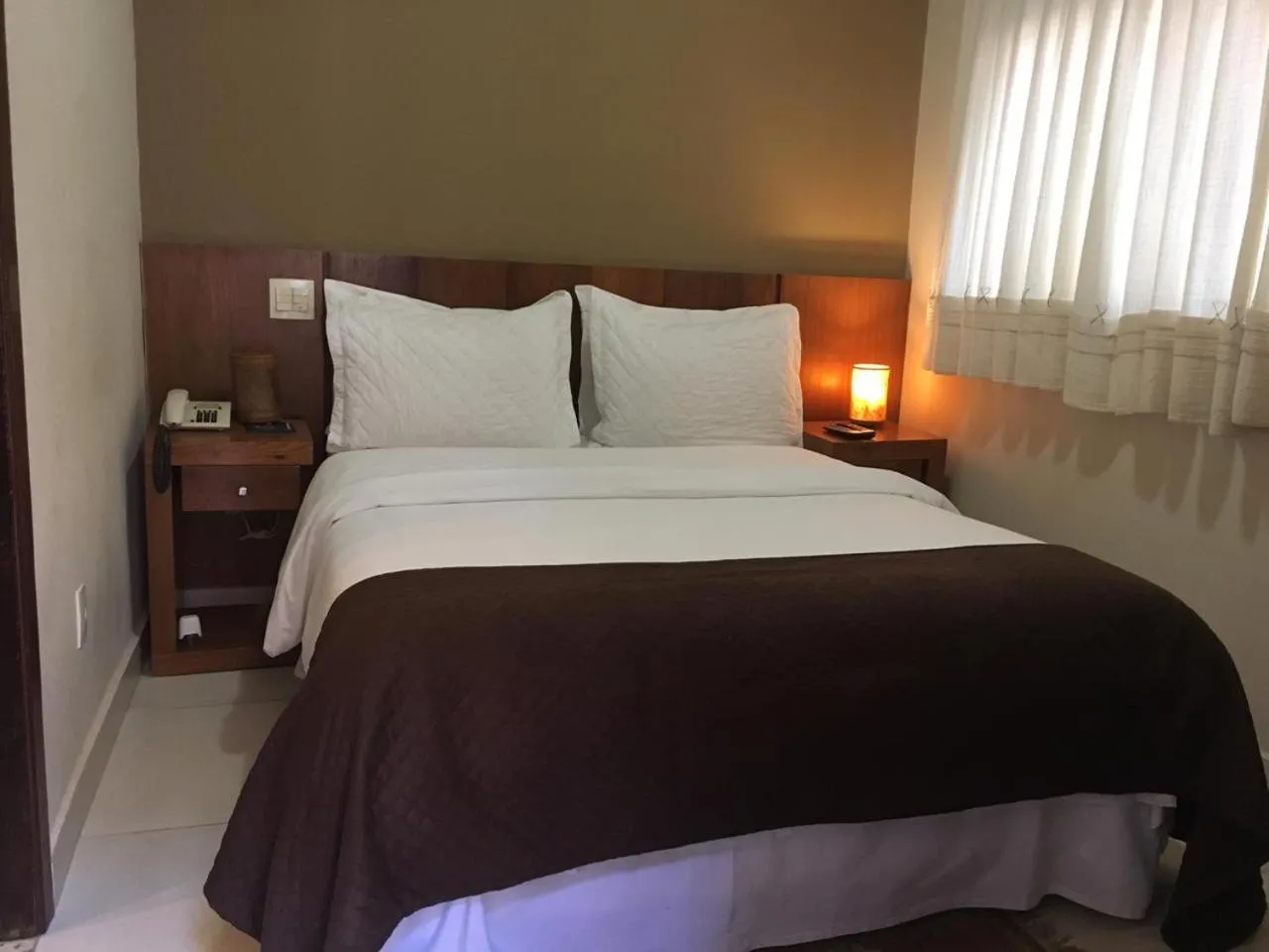 Bed in Pousada Jeito de Minas