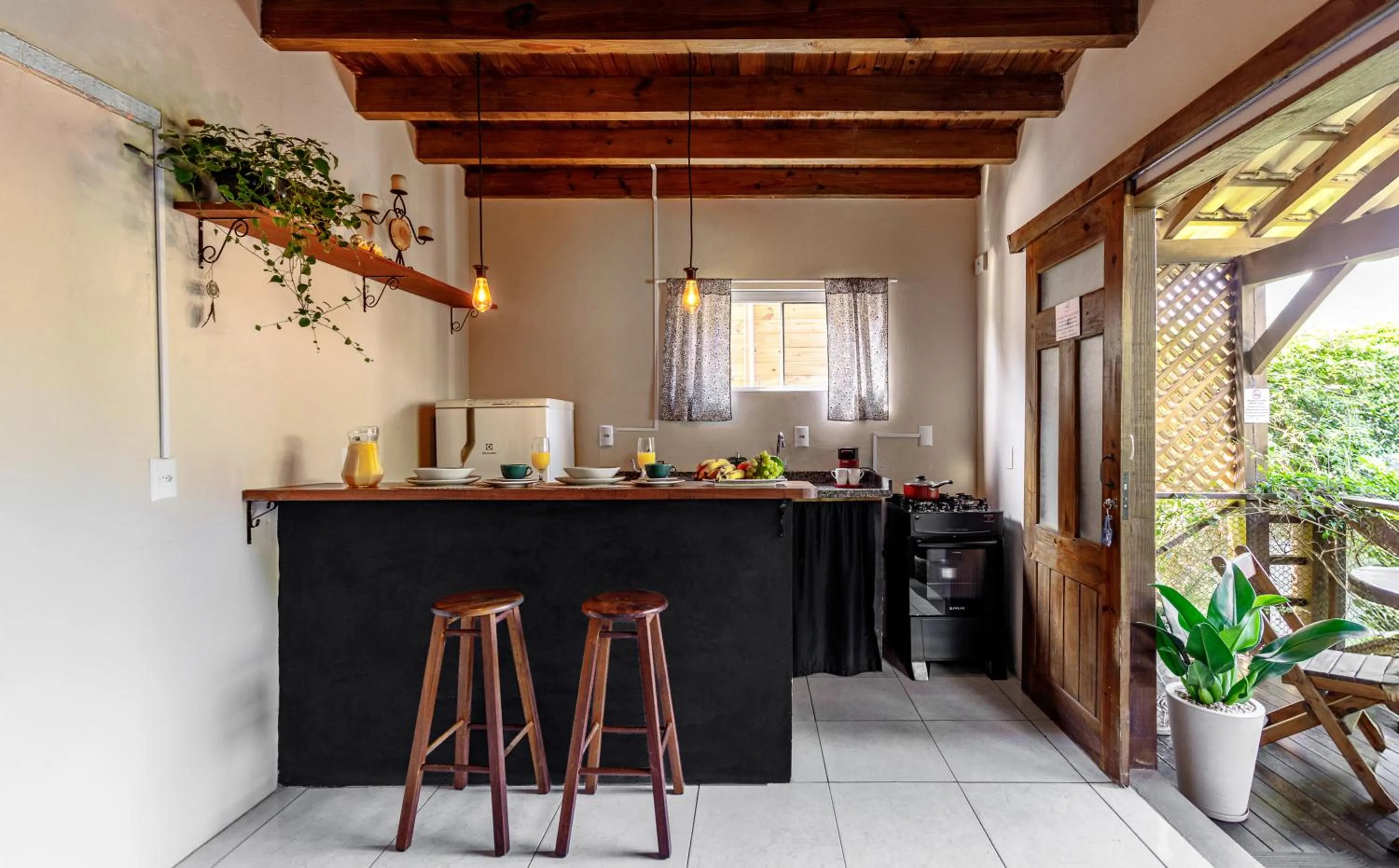 Kitchen or kitchenette in Moradas do Vale Praia do Rosa