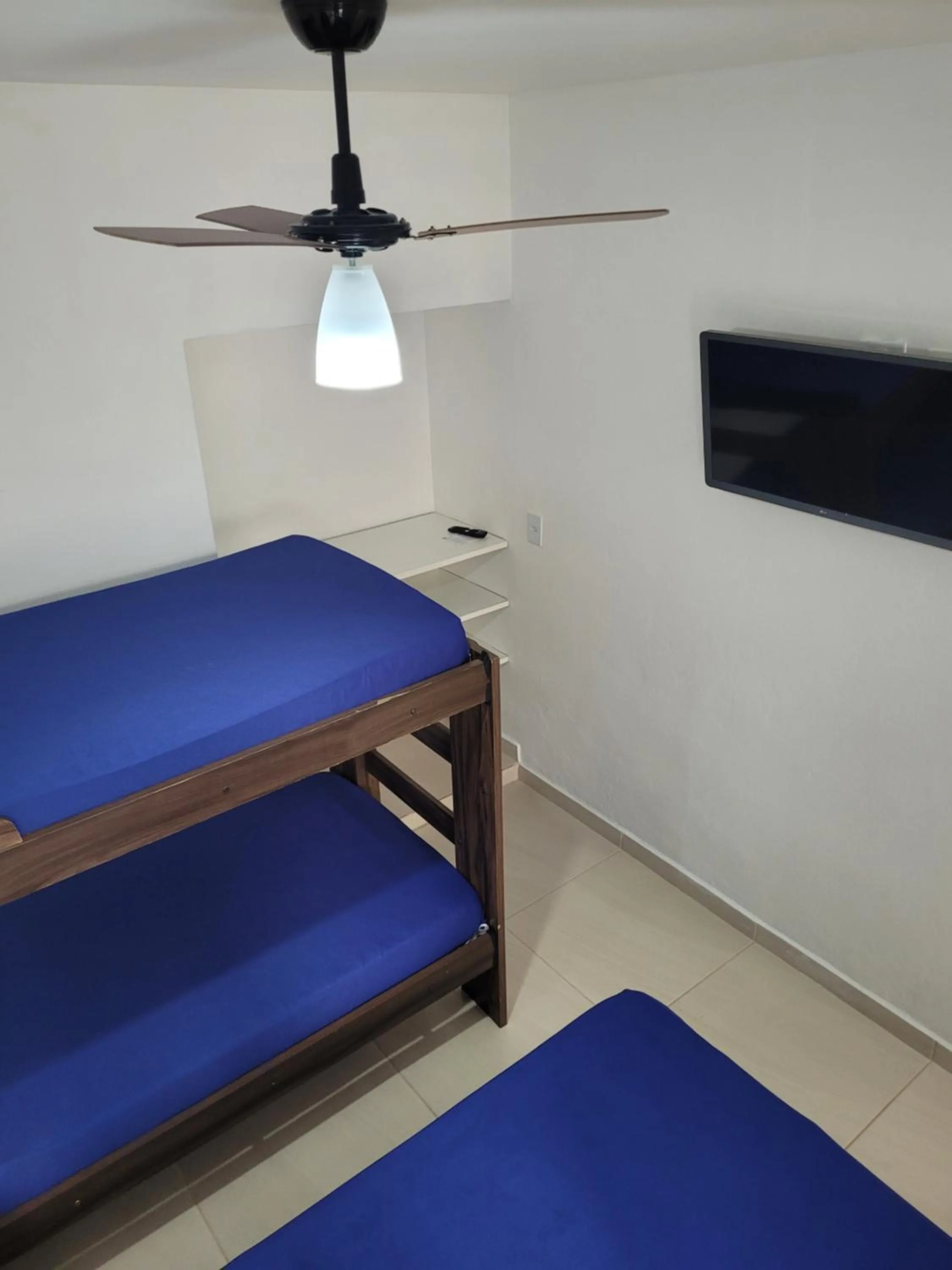 Bed in Kitchenette Charmosa no Itagua