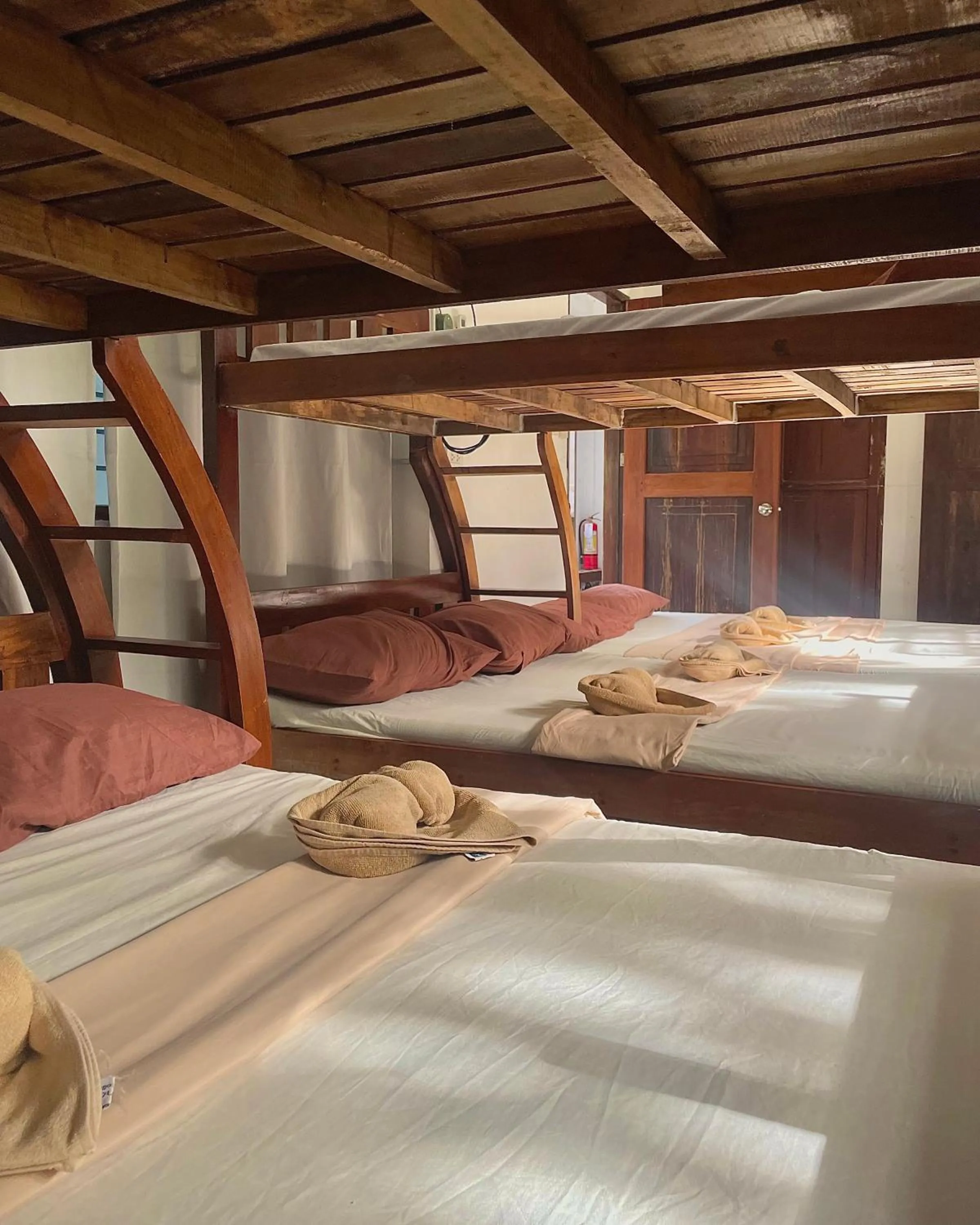 Bed in Patrick's on the Beach Resort