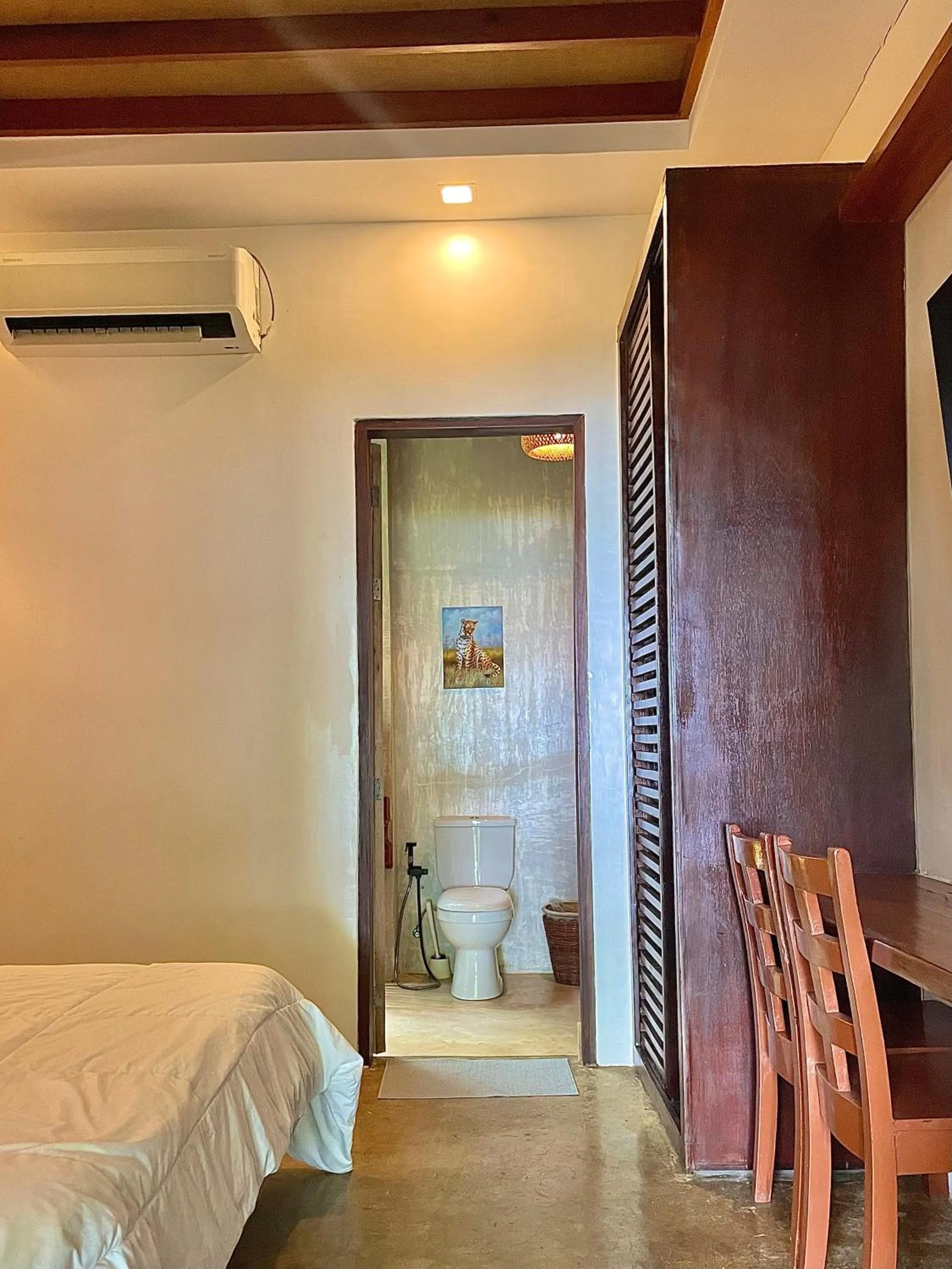 Bed in Patrick's on the Beach Resort