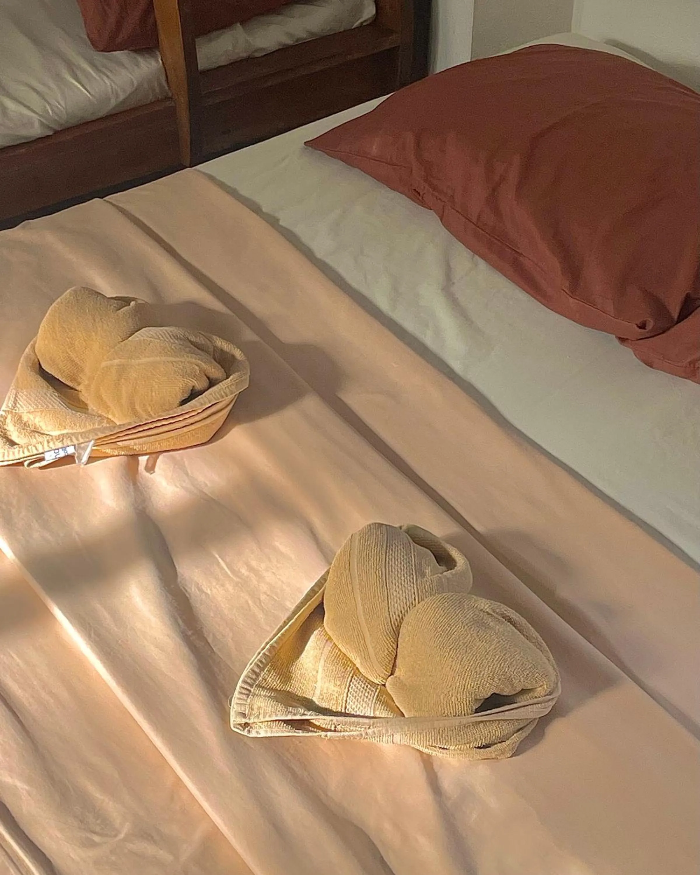 Bed in Patrick's on the Beach Resort