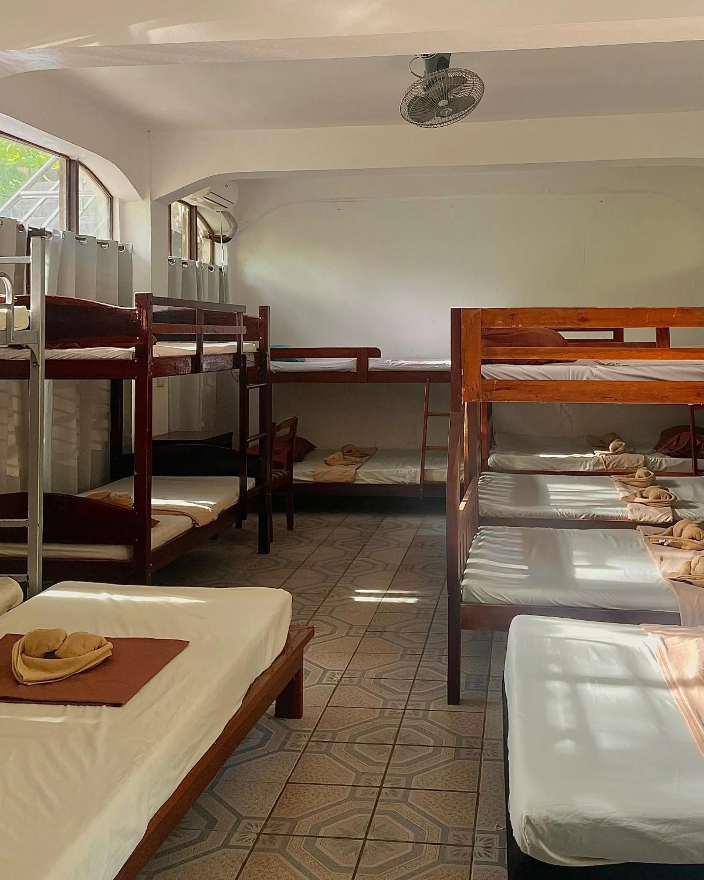 Bed in Patrick's on the Beach Resort