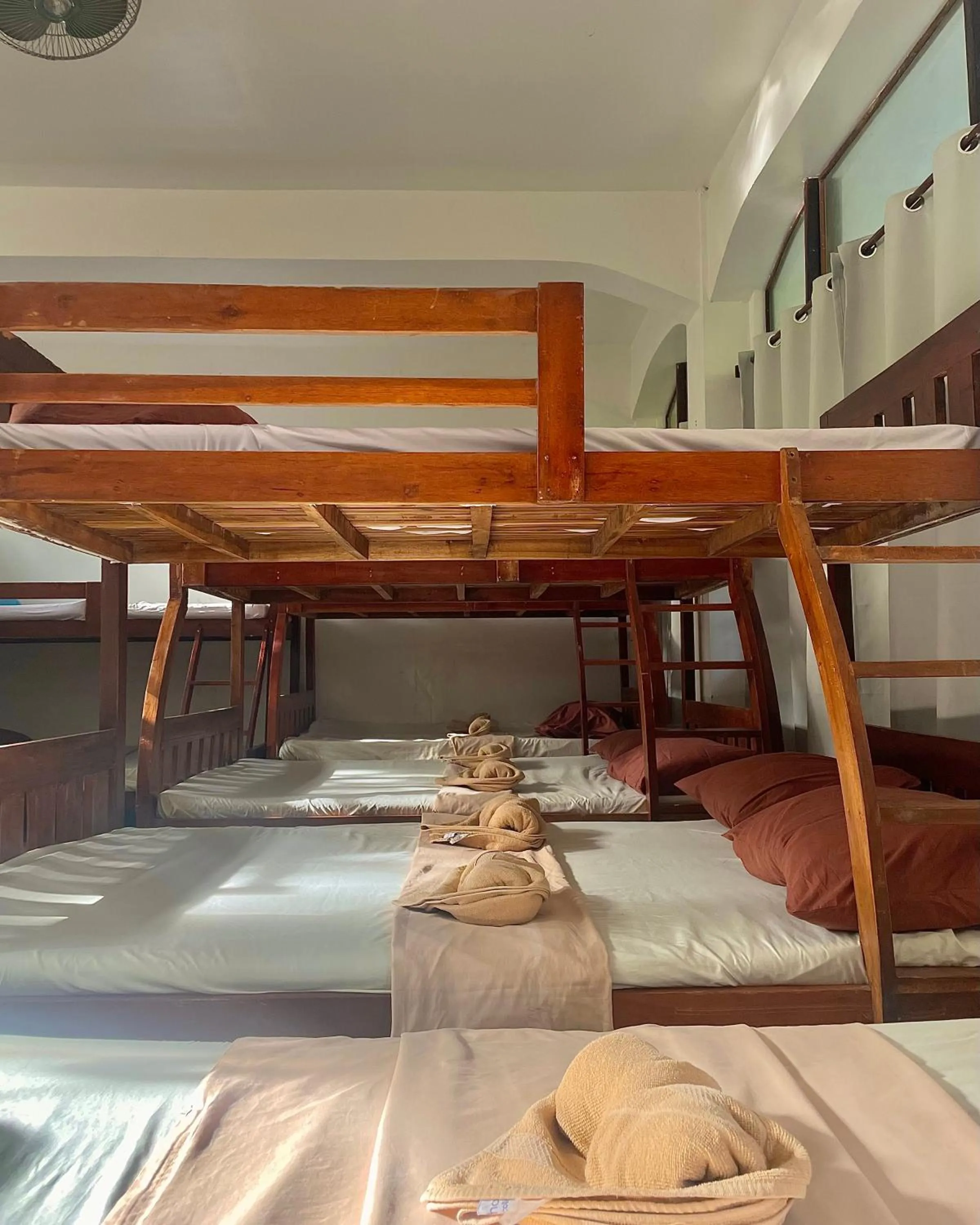 Bed in Patrick's on the Beach Resort