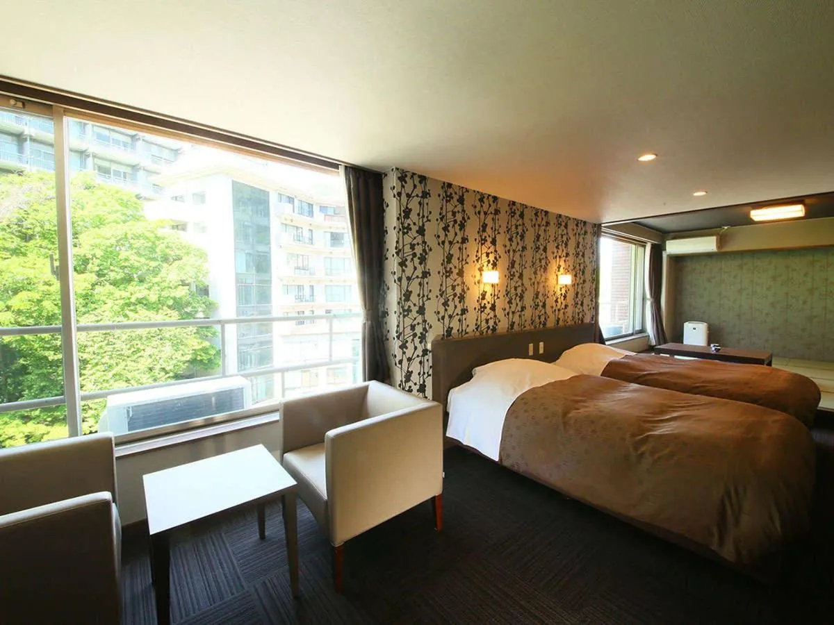 Bed in Ooedo Onsen Monogatari Premium Hotel New Shiobara