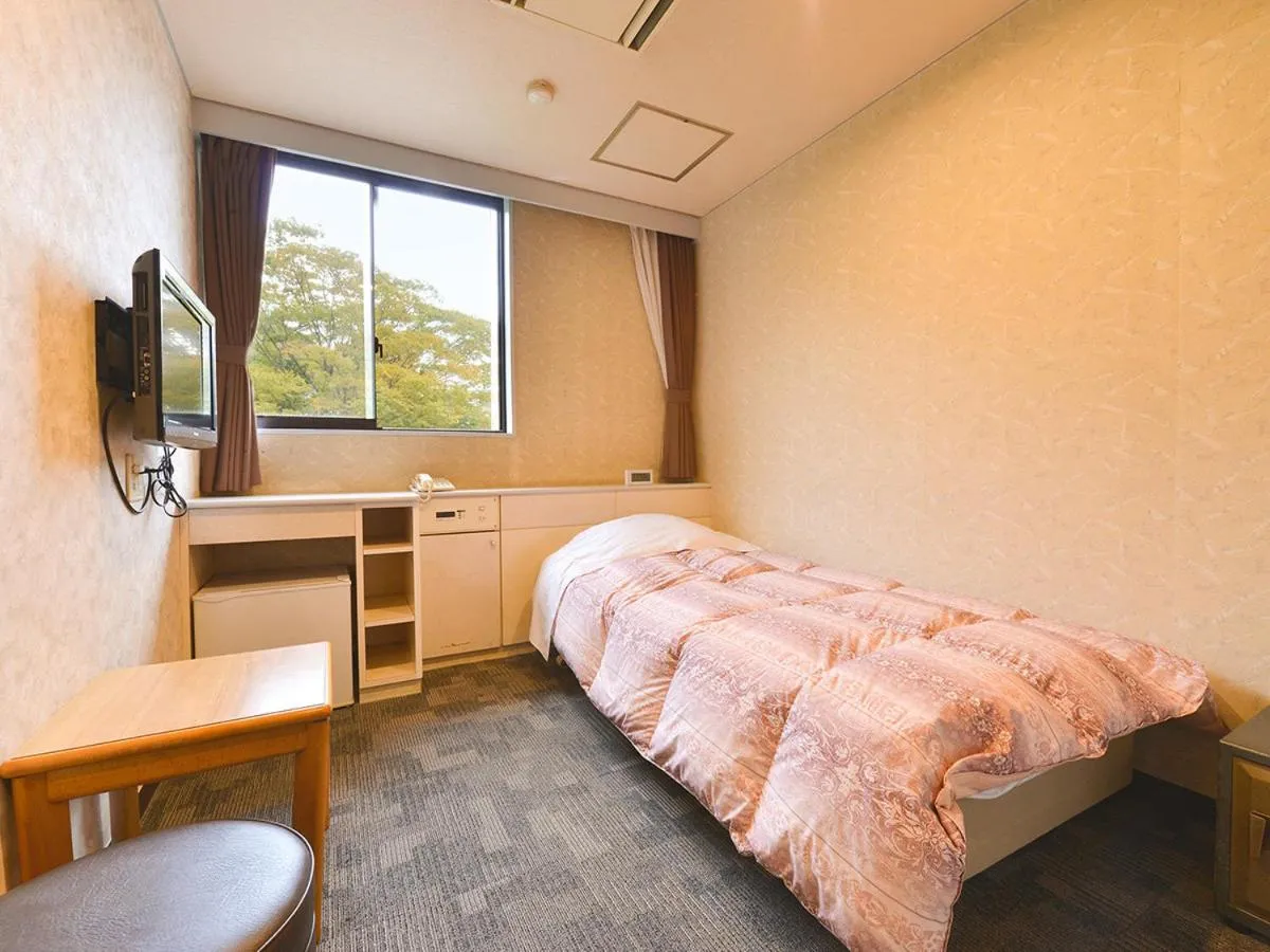 Bed in Ooedo Onsen Monogatari Premium Hotel New Shiobara